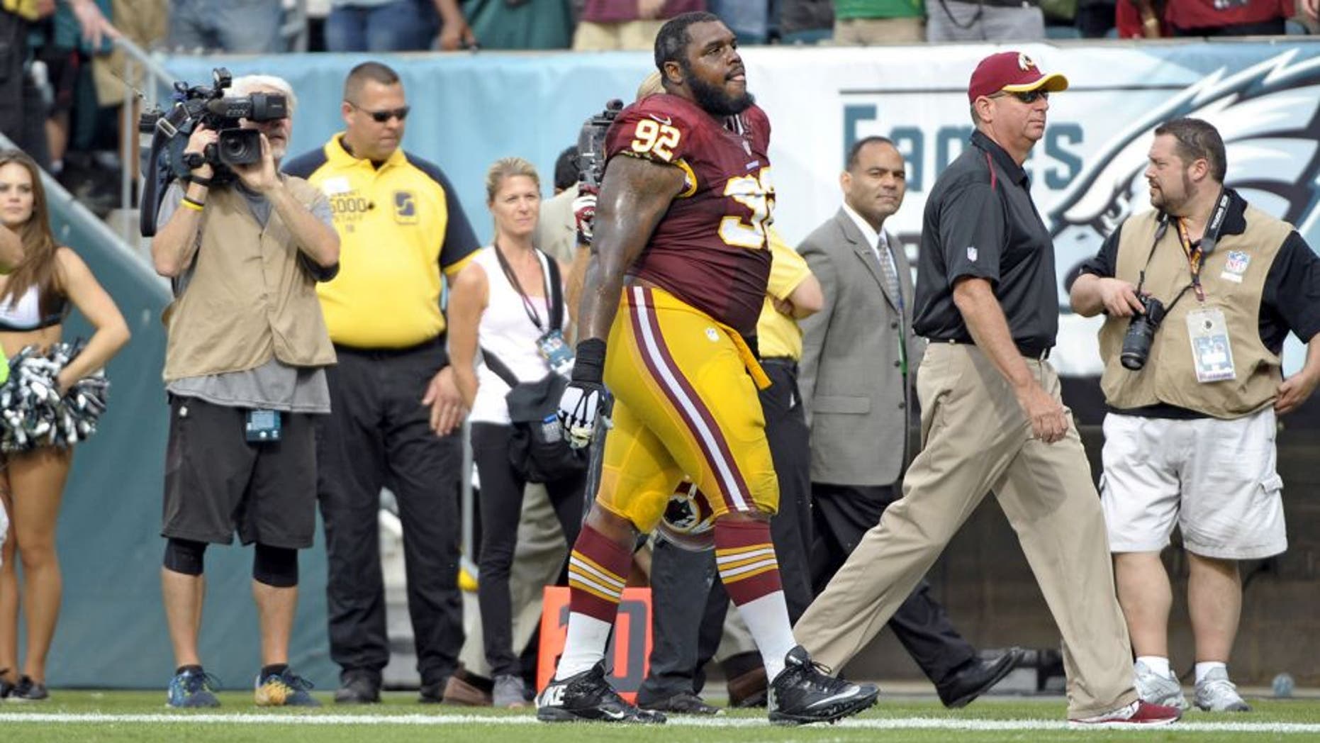 Sep 21, 2014; Philadelphia, PA, USA; Washington Redskins defensive end Chris Baker (92) walks off the field after being ejected during the fourth quarter against the Philadelphia Eagles at Lincoln Financial Field. The Eagles defeated the Redskins, 37-34. Mandatory Credit: Eric Hartline-USA TODAY Sports