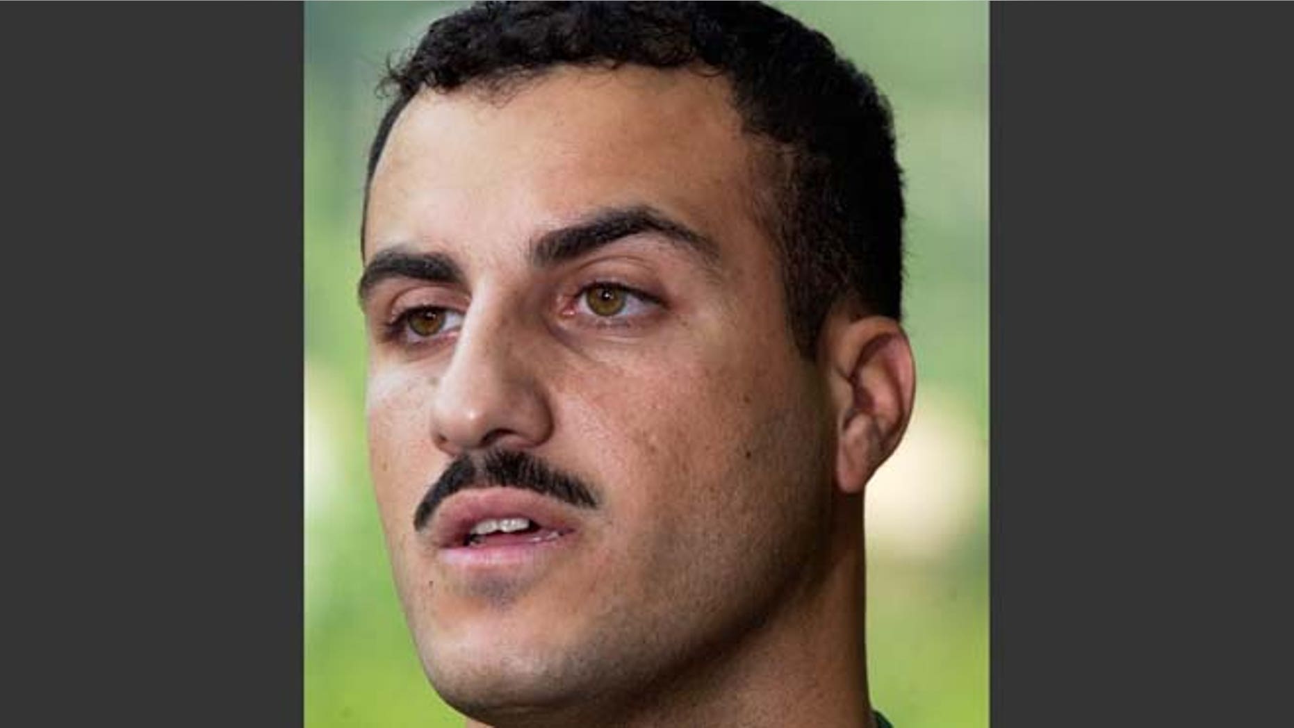 July 19, 2004: In this file photo, Marine Cpl. Wassef Ali Hassoun makes a statement to the media outside Quantico Marine Base in Quantico, Va.