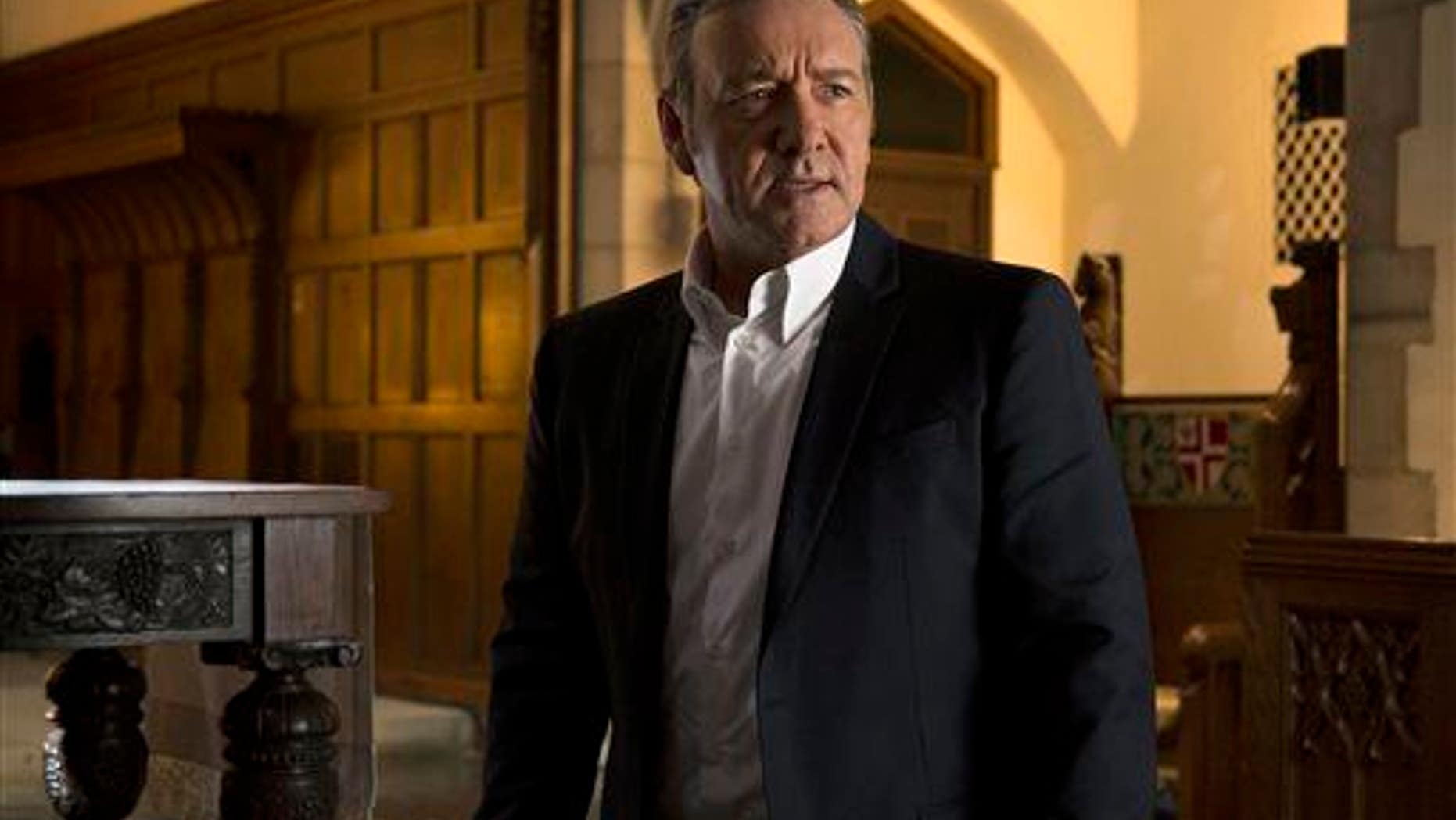 In this image released by Netflix, Kevin Spacey appears in a scene from "House of Cards." Binge watchers should be careful.