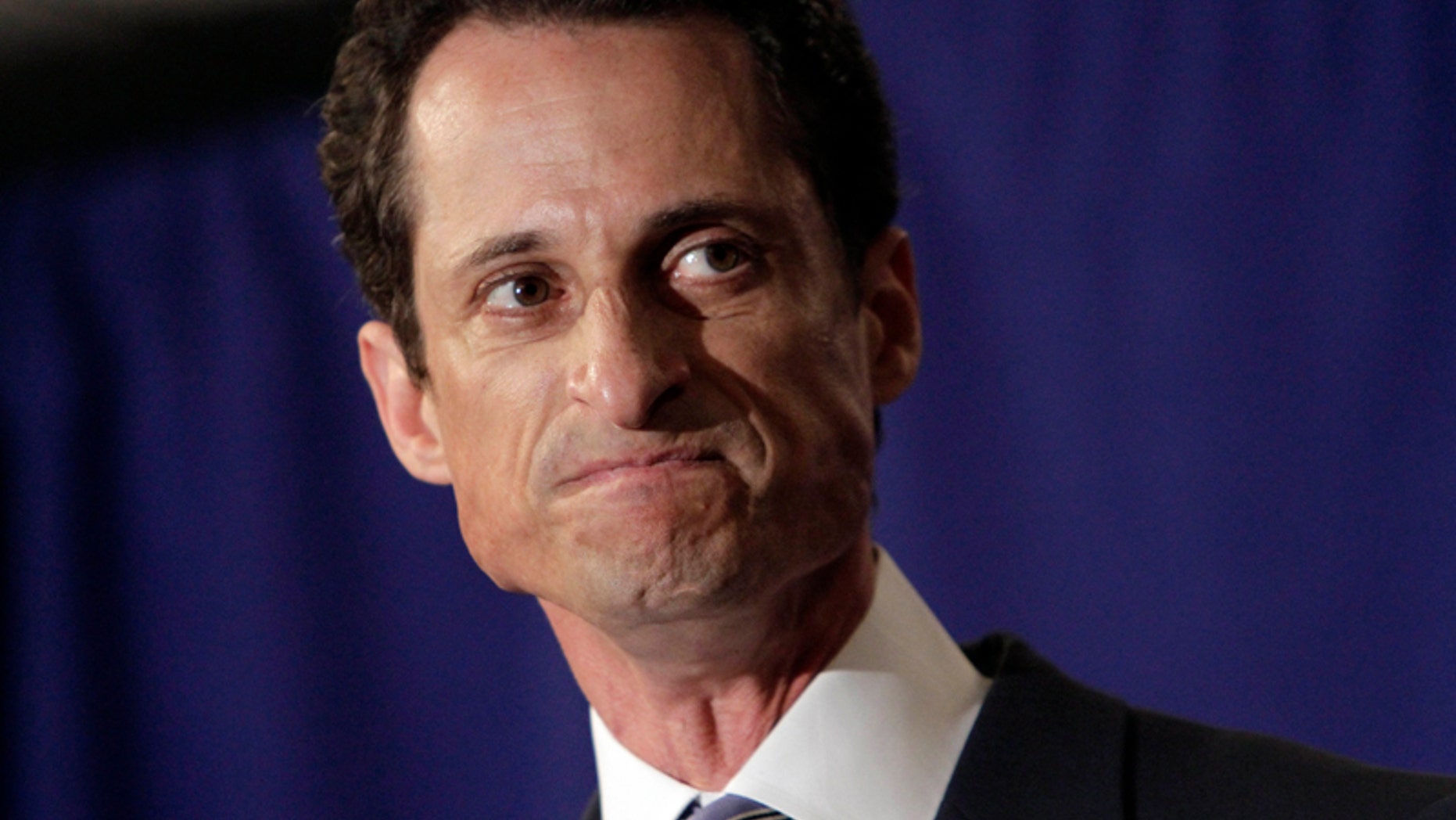 U.S. Rep. Anthony Weiner, D-N.Y., reacts during a news conference in New York, Monday, June 6, 2011. After days of denials, a choked-up New York Democratic Rep. Anthony Weiner confessed Monday that he tweeted a bulging-underpants photo of himself to a young woman and admitted to "inappropriate" exchanges with six women before and after getting married.