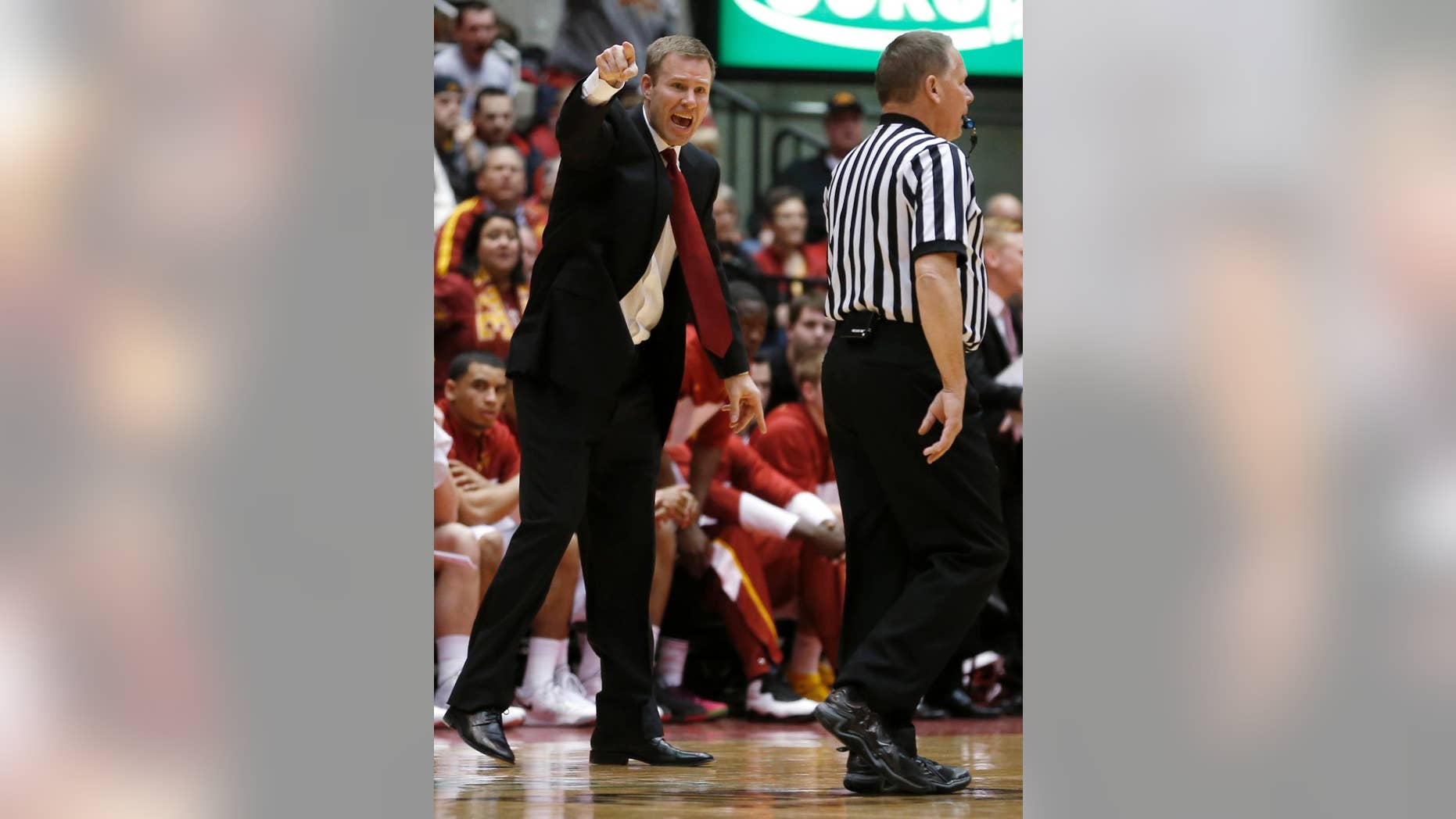 Iowa State coach Fred Hoiberg argues for a foul call against West Virginia during the first half of an NCAA college basketball game in Ames, Iowa, Wednesday, Feb. 26, 2014. (AP Photo/Justin Hayworth)