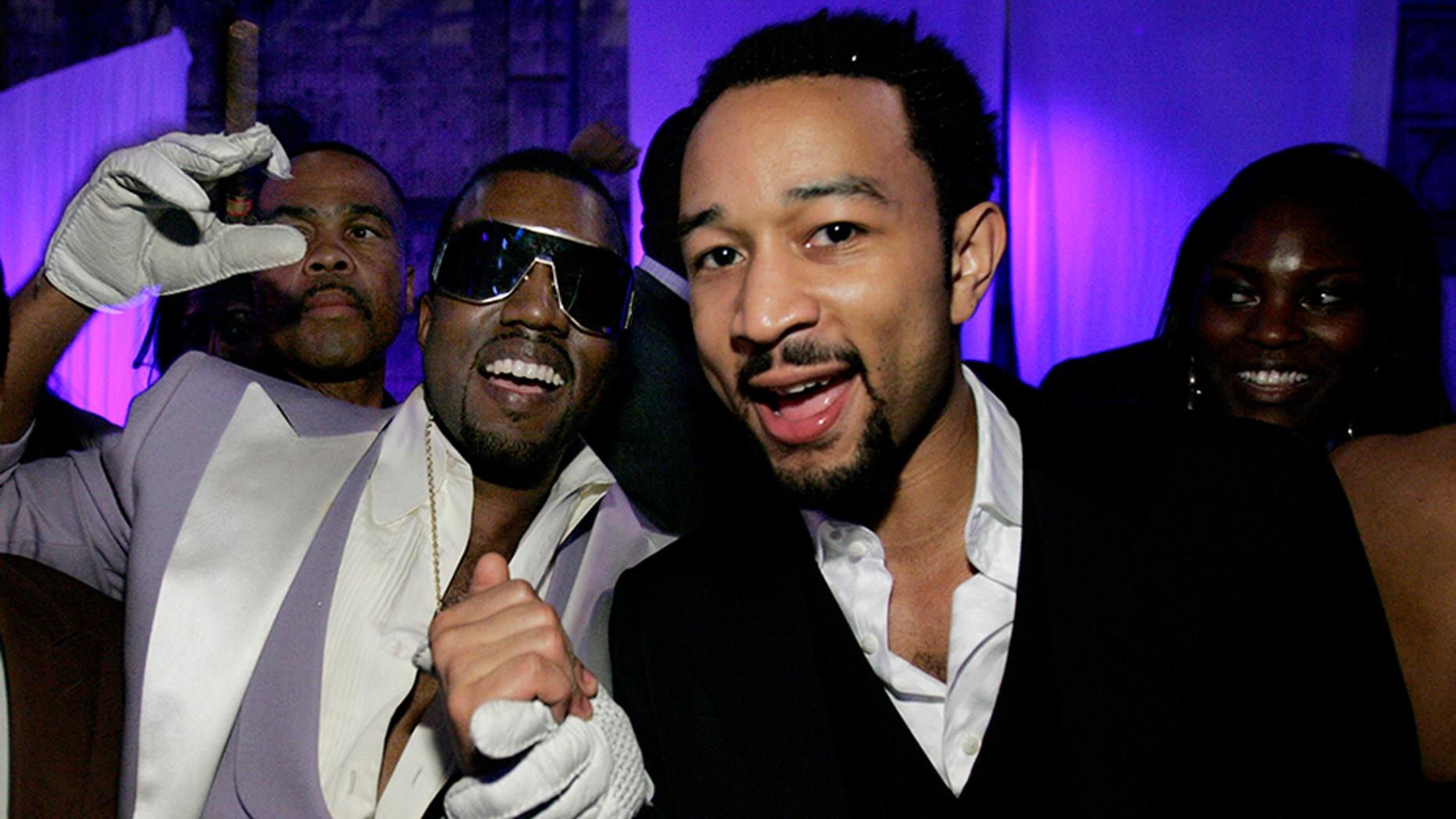 Kanye West accused John Legend of trying to manipulate his free thought.
