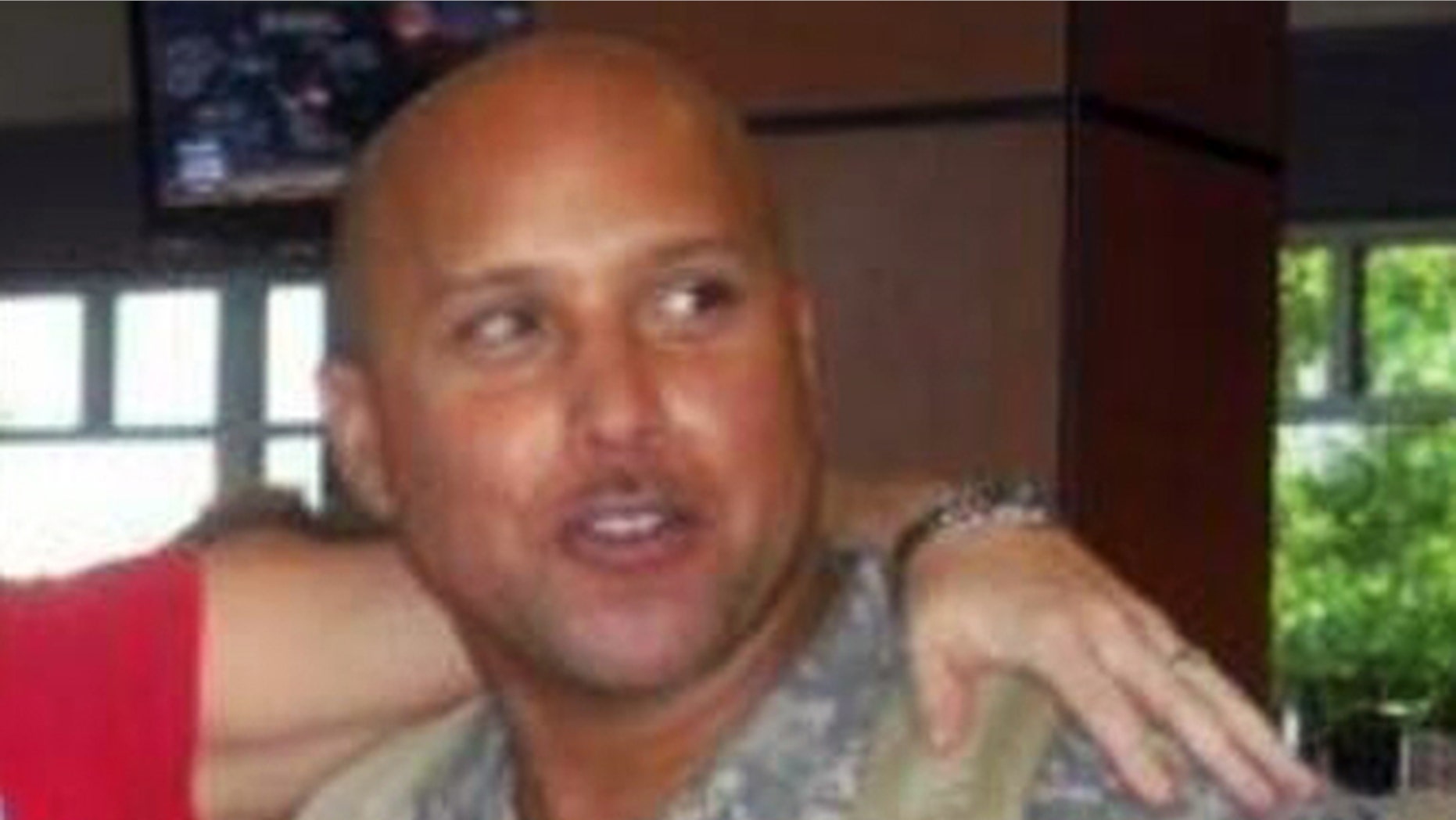 This Sept. 21, 2009 photo provided by Jerry Murphy shows Omar Gonzalez, who was married to Murphy's mother, Samantha, until they divorced in 2012.