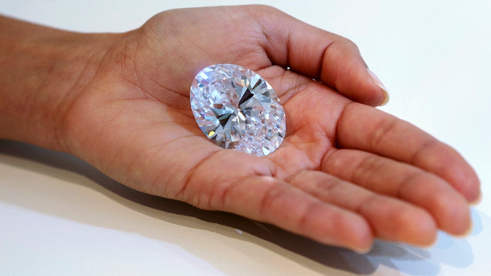 Sept. 4, 2013: A 118-carat white diamond is on display at Sotheby's, a New York auction house.