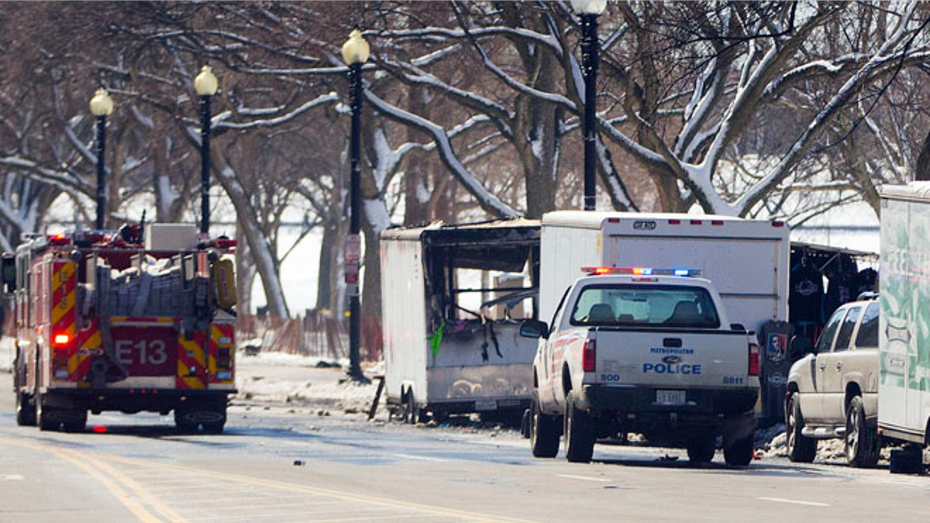 March 7, 2015: Police and fire vehicles along 15th St. NW near the White House, near a vendor cart that caught on fire, Washington, D.C.
