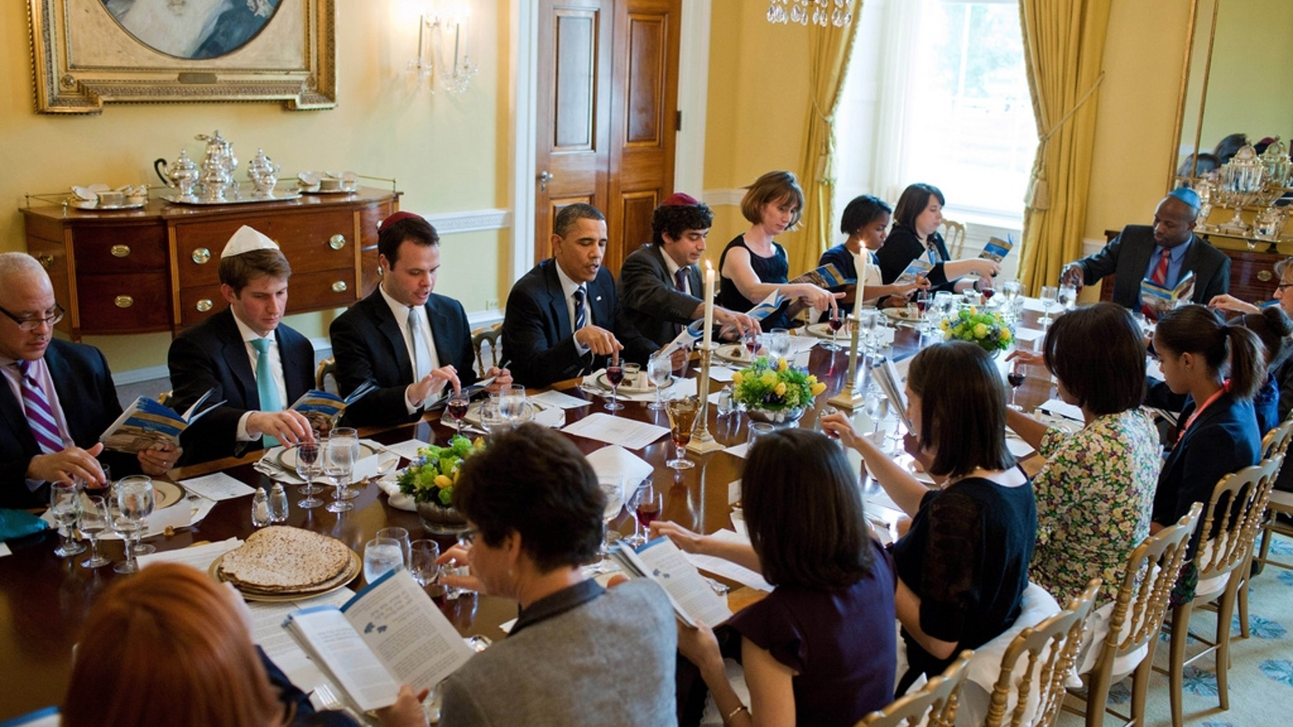 President Barack Obama and First Lady Michelle Obama mark the beginning of Passover with a Seder in the Old Family Dining Room of the White House, April 18, 2011. (Official White House Photo by Pete Souza)