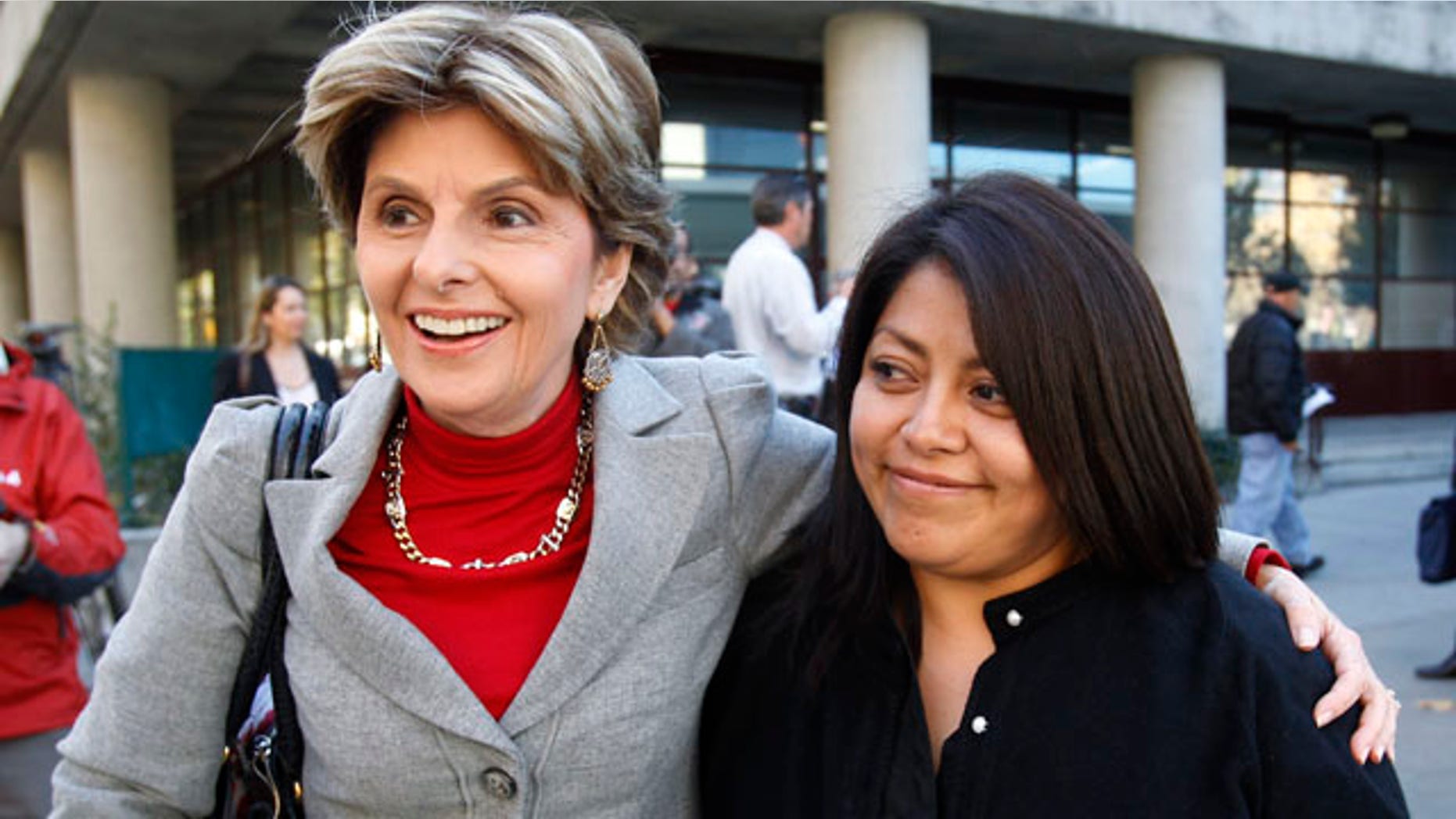 Nov. 17: Nicky Diaz Santillan, right, and her attorney Gloria Allred, left, smile as they leave a hearing in San Jose, Calif. Former California gubernatorial candidate Meg Whitman agreed to provide Diaz Santillan, her former housekeeper of nine years and an illegal immigrant, with $5,500 in unpaid wages in a settlement.