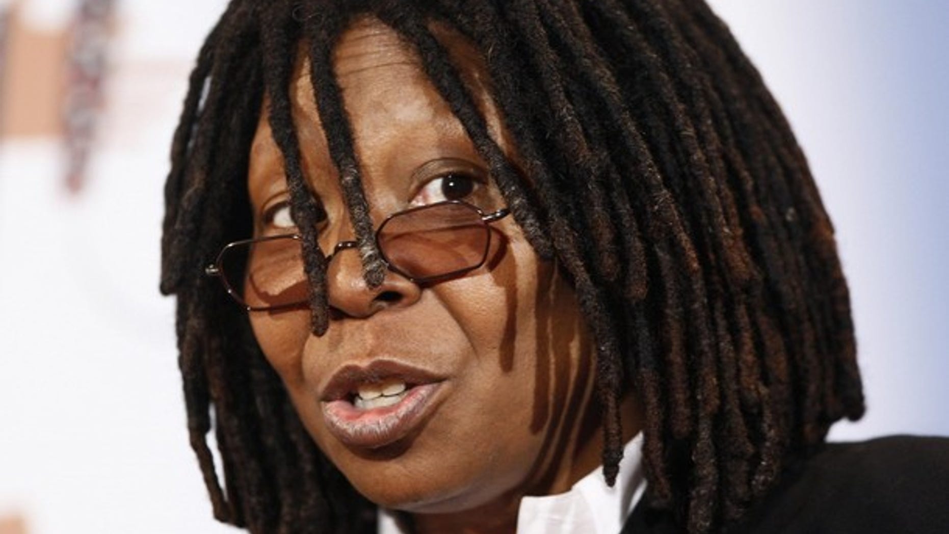 Actress and comedian Whoopi Goldberg attends a news conference to announce new musical at Operetta house in Hamburg December 4, 2009. Stage Entertainment Germany will present the famous musical 'Sister Act' at the TUI Operetta house at Hamburg's Reeperbahn from autumn 2010 on. REUTERS/Christian Charisius (GERMANY - Tags: ENTERTAINMENT HEADSHOT)