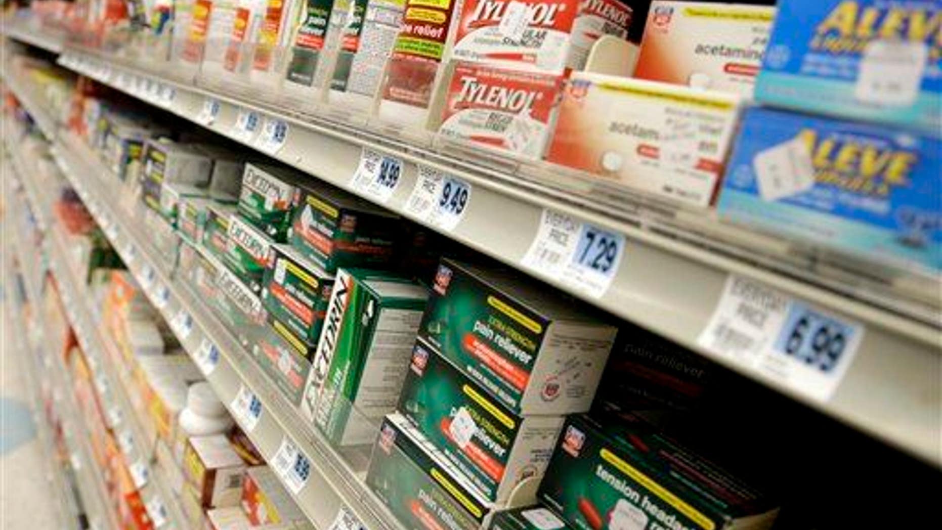 This photo taken March 10, 2013 shows non-prescription drugs displayed at a pharmacy in New York.