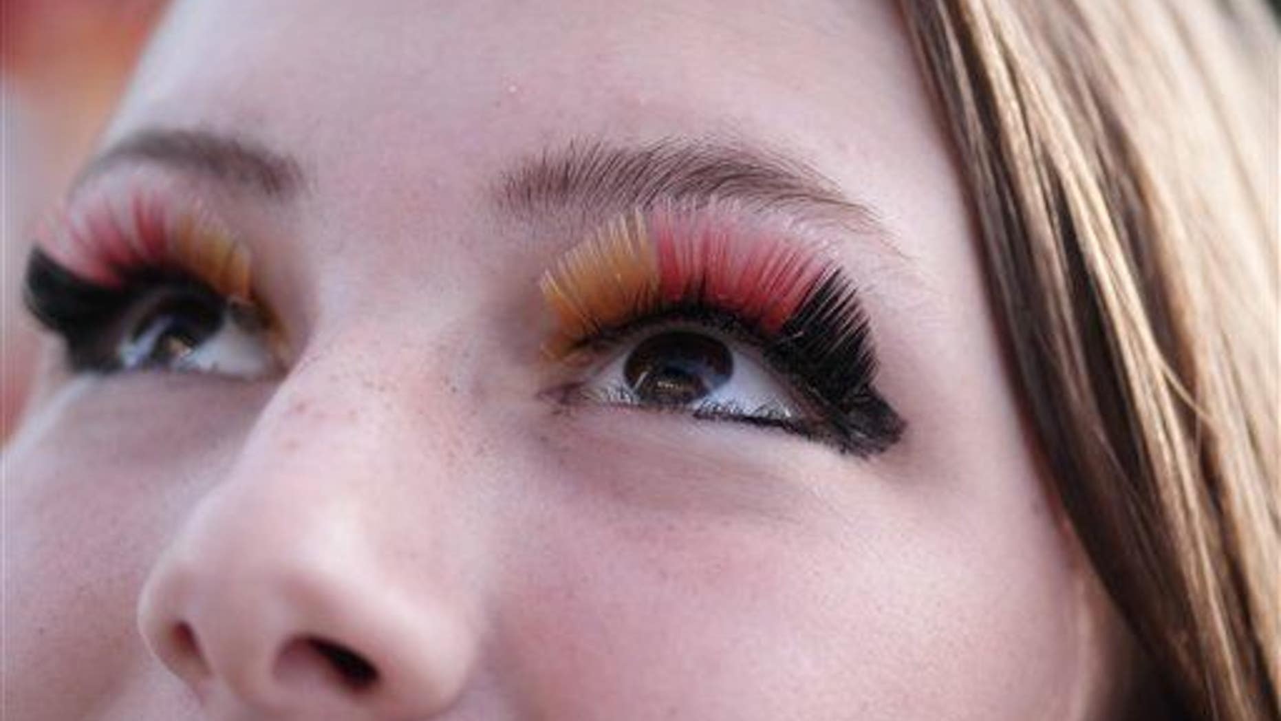 A woman with painted eyelashes in Germany, on Monday, June 30, 2014.