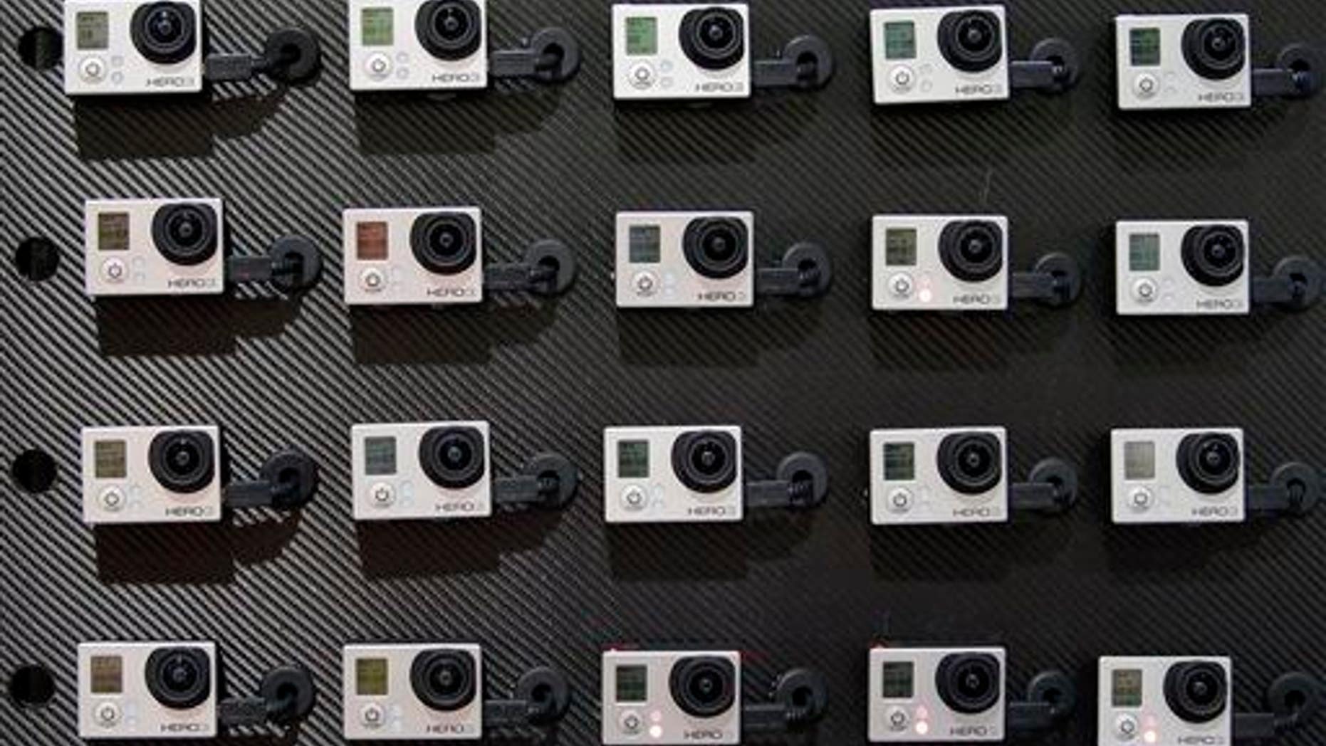 This Jan. 8, 2013 file photo shows a display of video cameras at the International Consumer Electronics Show in Las Vegas.