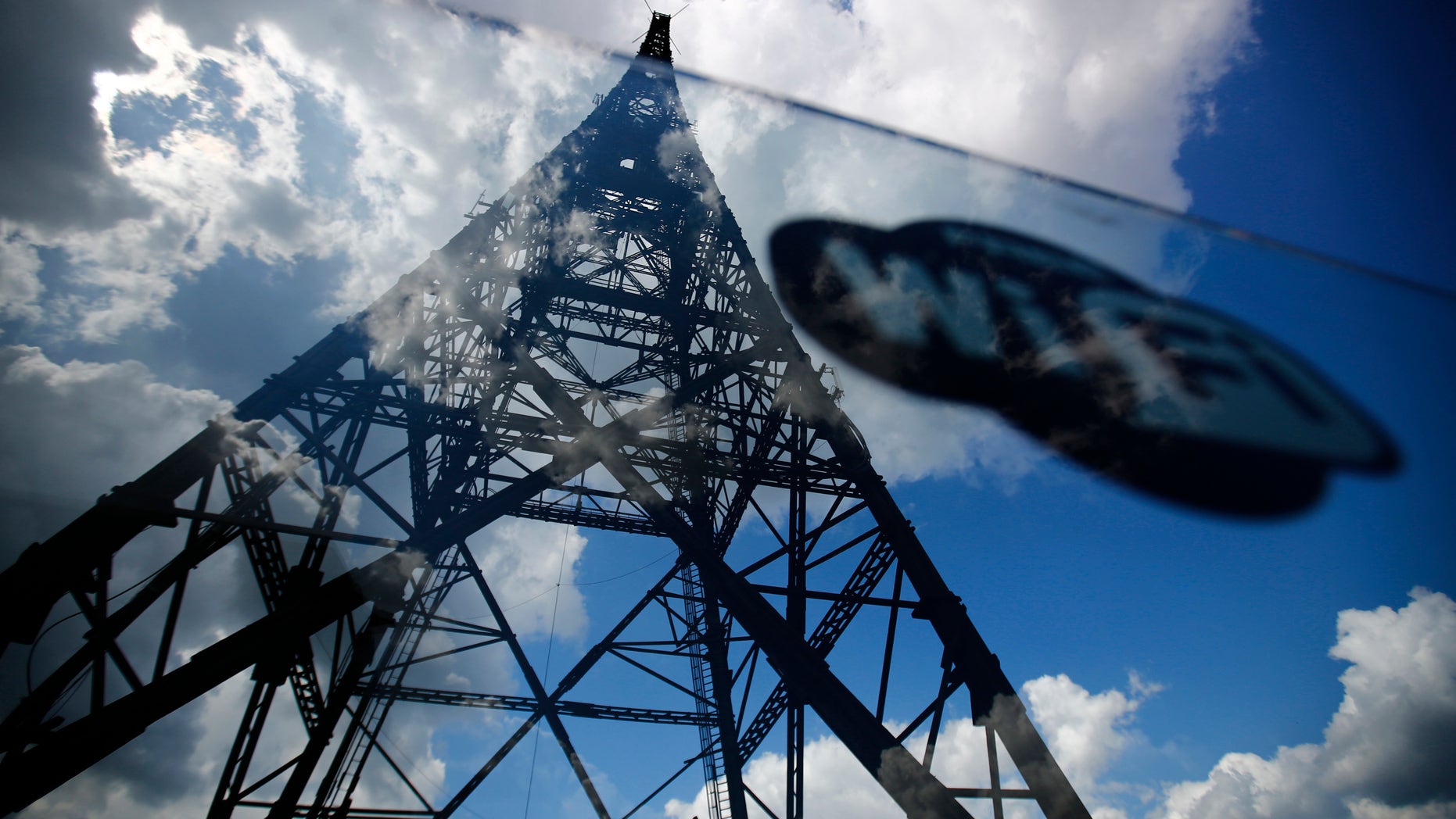 A sticker with Wifi sign is seen on a glass fence around Gliwice radio tower, Europe's tallest wooden structure, at Gliwice radio station in Upper Silesia, southern Poland.