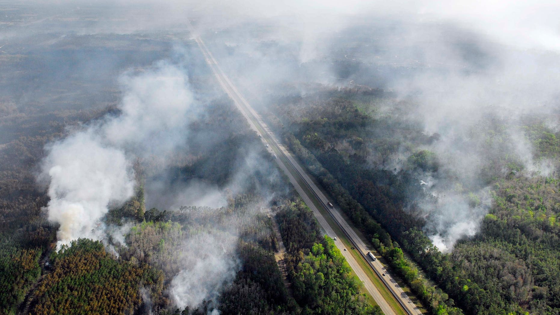 Mar. 1: Flames from a wildfire still burn on both sides of Interstate 95 in the north part of Brevard county as over 10,000 acres burn near the Volusia & Brevard County line in Scottsmoor, Fla.