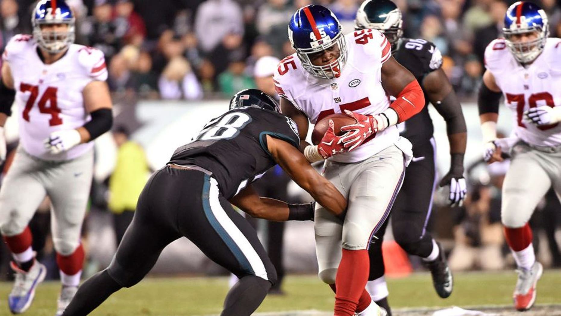 Oct 19, 2015; Philadelphia, PA, USA; New York Giants tight end Will Tye (45) is tackled by Philadelphia Eagles outside linebacker Jordan Hicks (58) during the first quarter at Lincoln Financial Field. Mandatory Credit: Eric Hartline-USA TODAY Sports