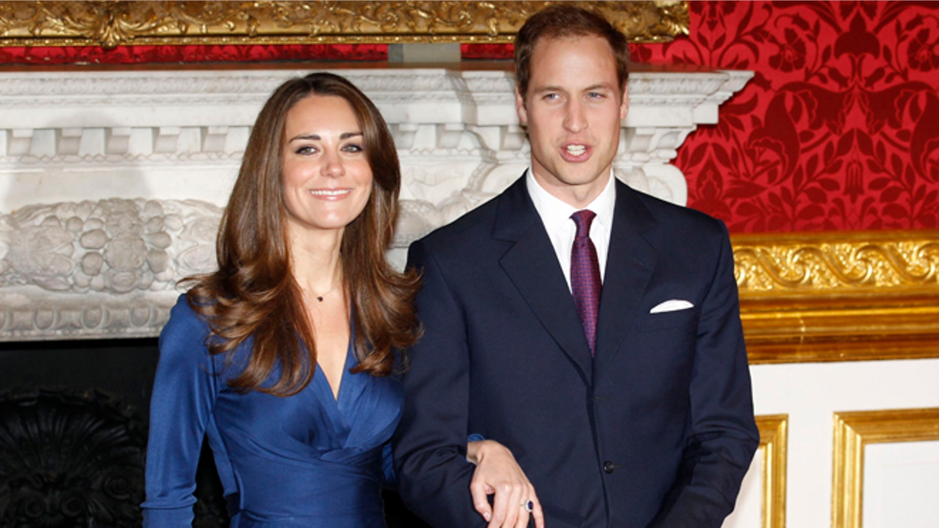 Britain's Prince William and his fiancee Kate Middleton (L) pose for a photograph in St. James's Palace, central London November 16, 2010. Britain's Prince William is to marry his long-term girlfriend Kate Middleton next year, after an on-off courtship lasting nearly a decade, bringing months of speculation about his intentions to an end. REUTERS/Suzanne Plunkett (BRITAIN - Tags: ENTERTAINMENT SOCIETY ROYALS) - RTXUPLP