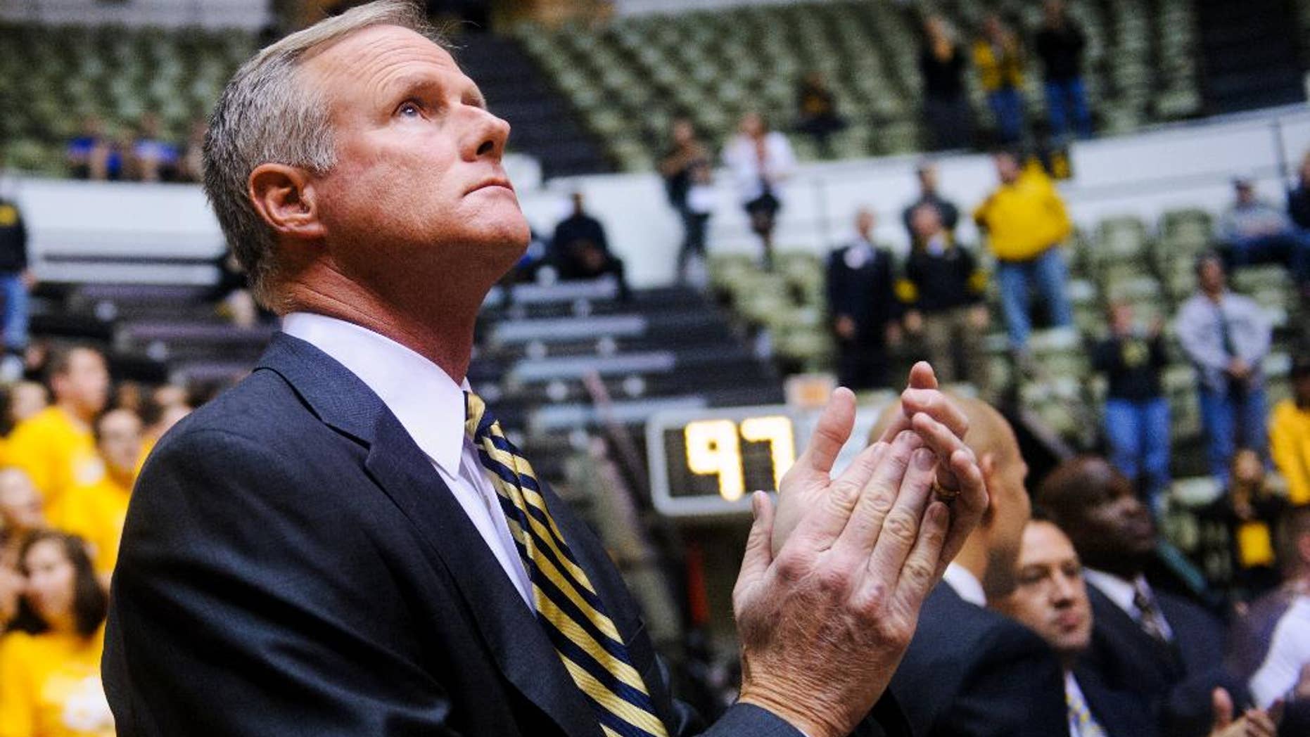 Missouri head coach Kim Anderson stands before the start of an NCAA college basketball game against William Jewell in Columbia, Mo., on Wednesday, Oct. 29, 2014. (AP Photo/The Columbia Daily Tribune, Nick Schnelle)