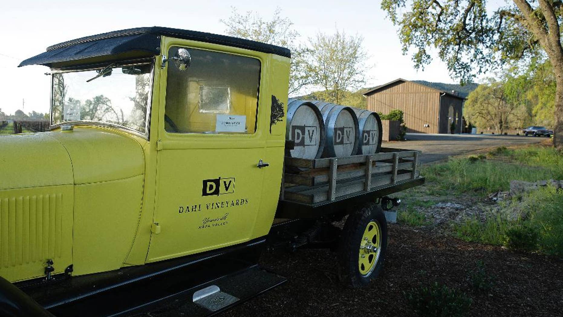 FILE - In this March 18, 2015 file photo, a 1926 Model T Ford truck is parked at the entrance to Dahl Vineyards in Yountville, Calif. A police dispatcher told police that a man later identified as a Silicon Valley investor had been shot and wounded while an assailant chased him through a California vineyard, according to the 911 recordings released Tuesday, March 24, 2015. The tapes show police arrived at Dahl Vineyards shortly before noon, four minutes after the initial 911 call and just moments before authorities say vintner Robert Dahl shot Emad Tawfilis in the head at close range. Tawfilis died at the scene. Dahl then led police on a brief, high-speed chase through Napa Valley wine country before stopping and committing suicide with a shot to the head. (AP Photo/Eric Risberg, File)
