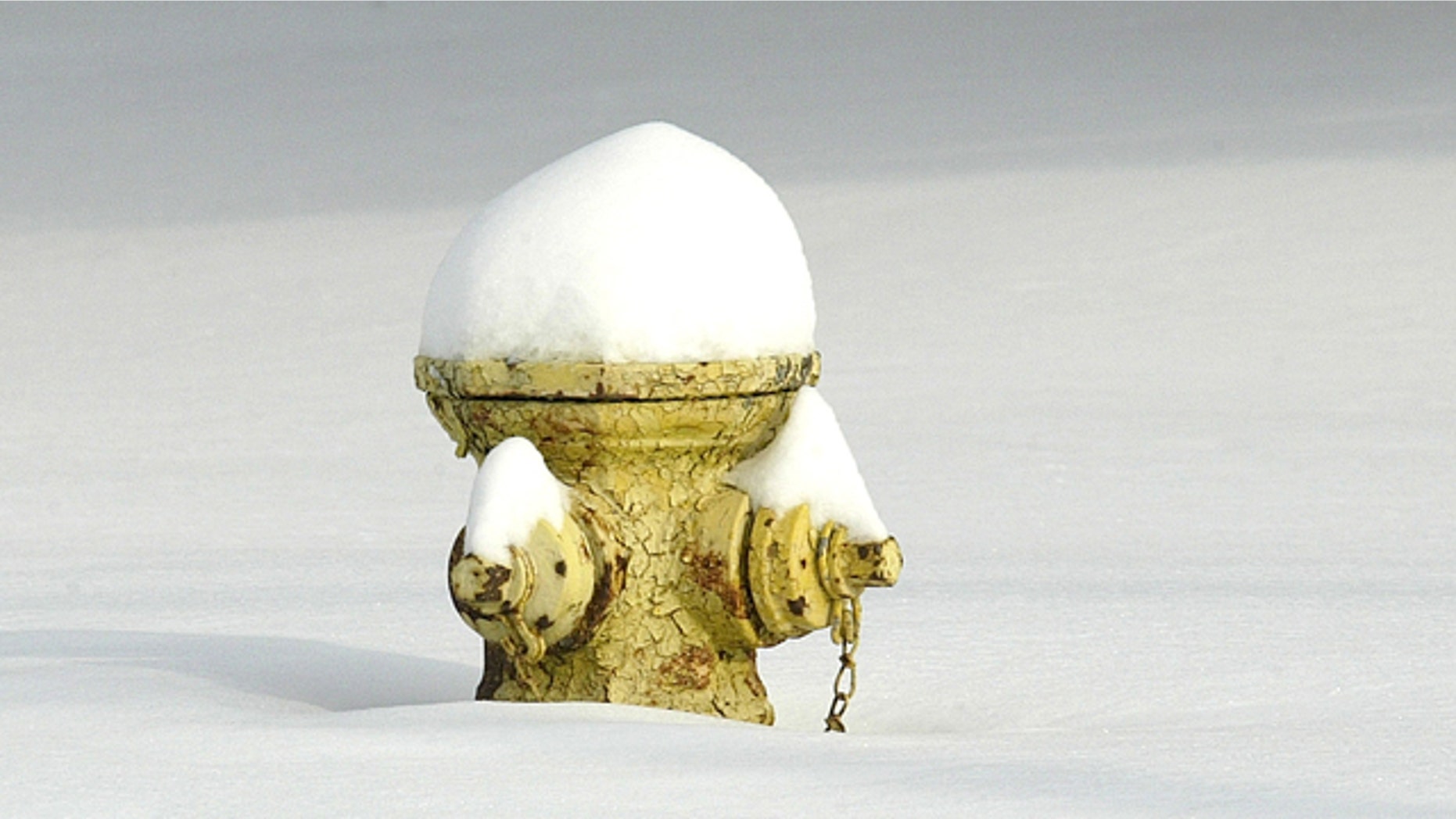 A fire hydrant pokes out from the snow in Kirksville, Mo. on Thursday Jan. 7, 2010 after an overnight storm.