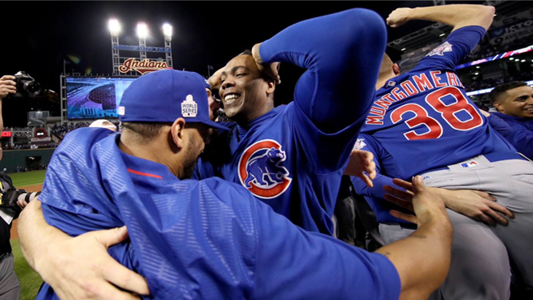 CLEVELAND, OH - NOVEMBER 02: Aroldis Chapman #54 of the Chicago Cubs celebrates with teammates after defeating the Cleveland Indians 8-7 in Game Seven of the 2016 World Series at Progressive Field on November 2, 2016 in Cleveland, Ohio. The Cubs win their first World Series in 108 years. (Photo by Ezra Shaw/Getty Images)