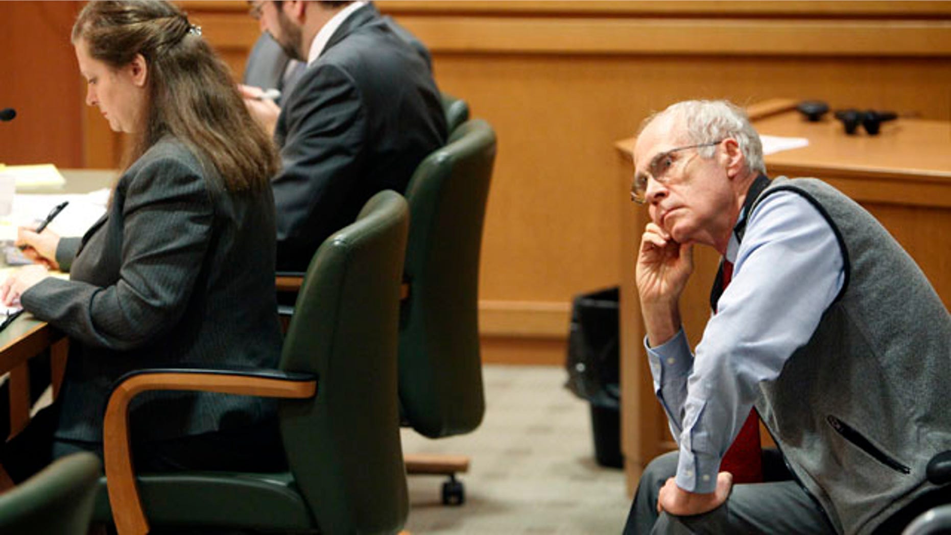 March 18: Wisconsin Secretary of State Doug La Follette listens to arguments during a hearing in Dane County Court in Madison, Wis.
