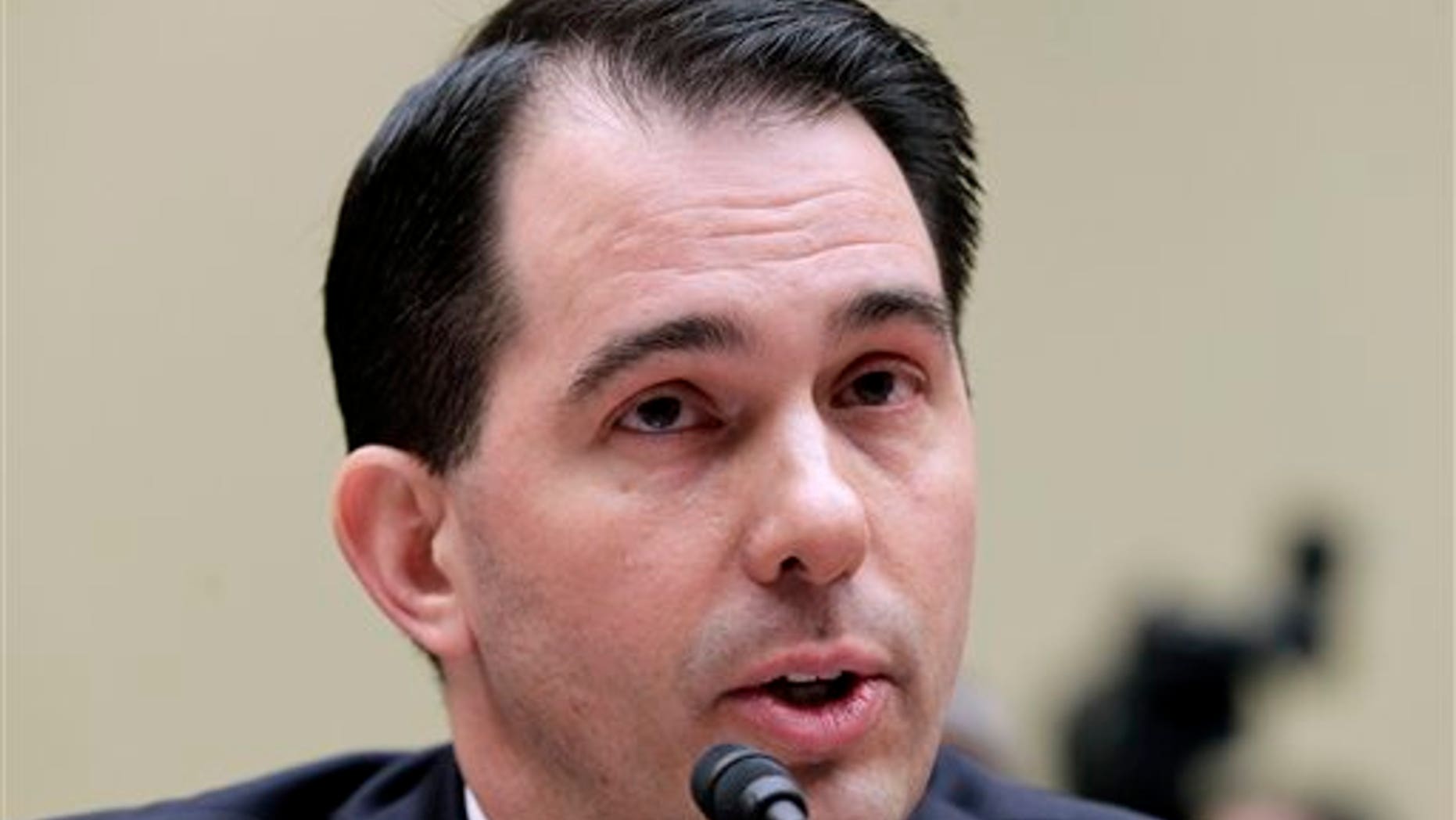April 14: Wisconsin Gov. Scott Walker testifies on Capitol Hill in Washington, before the House Oversight and Government Reform Committee hearing to discuss the problems with balancing state budgets in a tough economy. (AP)