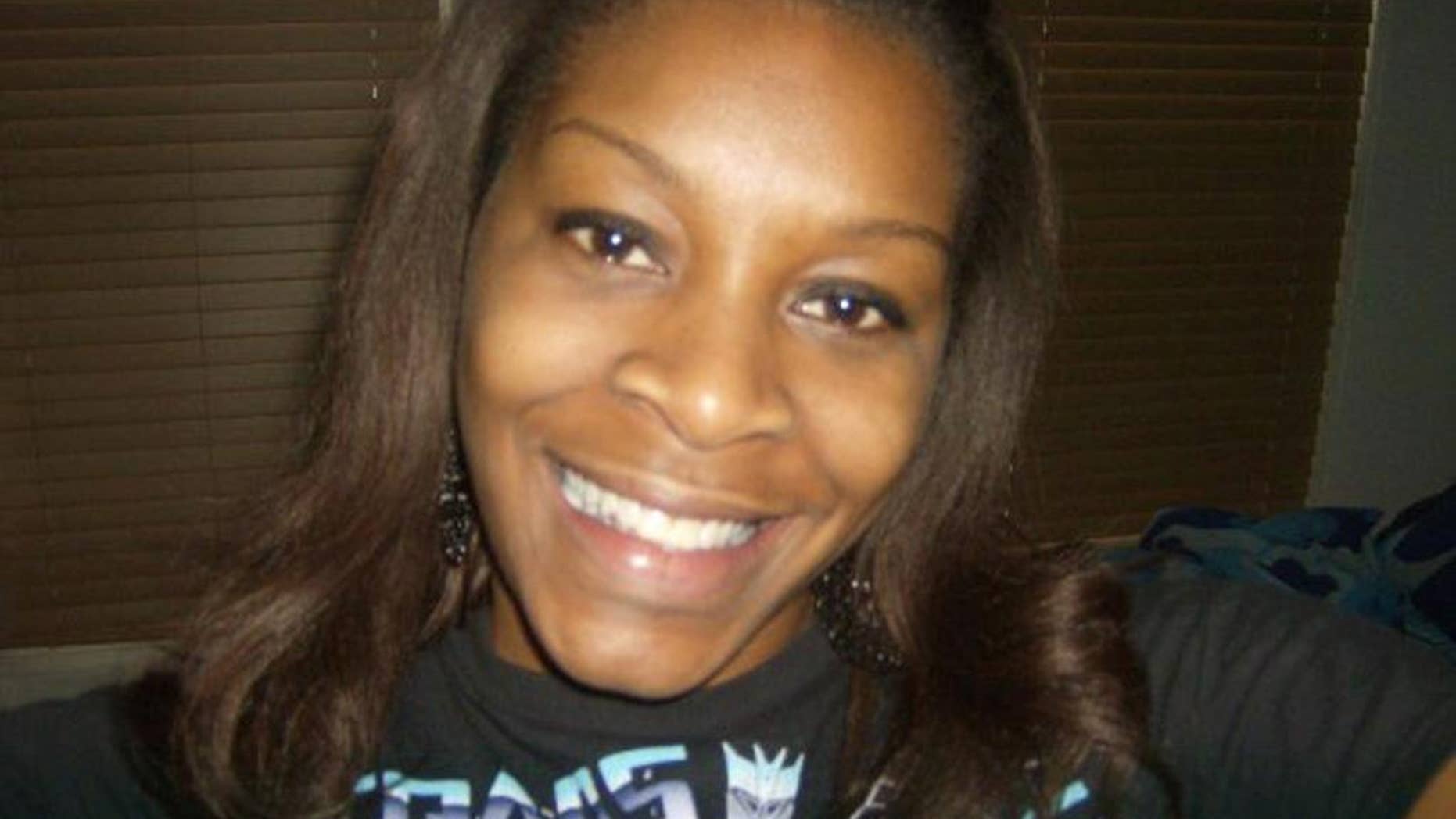 In this undated photo provided by the Bland family, Sandra Bland poses for a photo. The family of Bland, who was found dead in her Texas jail cell, assert that she would not have taken her own life, but authorities are pointing to mounting evidence that they say shows she hanged herself. (Courtesy of Bland family)