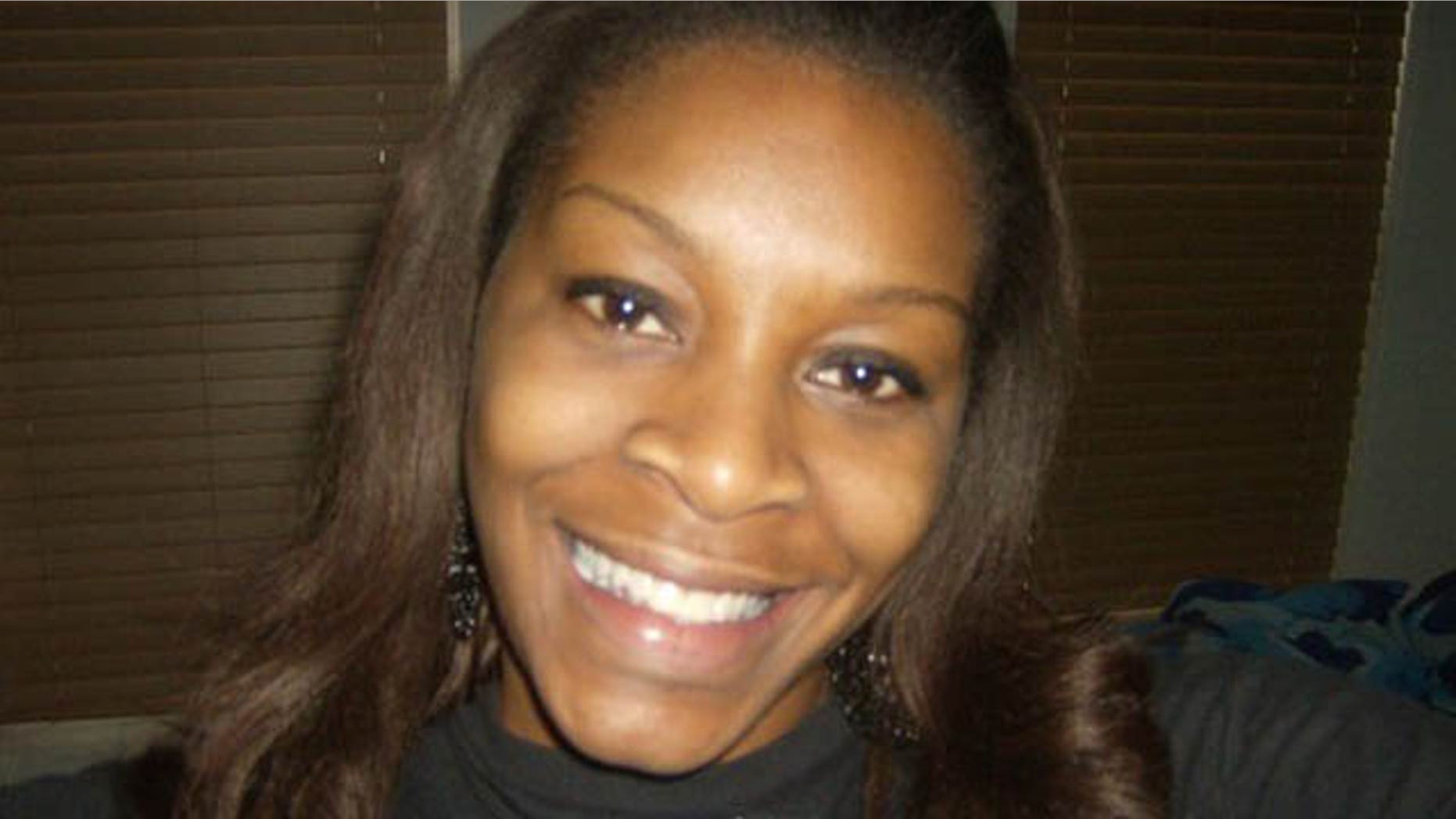 In this undated photo provided by the Bland family, Sandra Bland poses for a photo. The family of Bland, who was found dead in her Texas jail cell, assert that she would not have taken her own life, but authorities are pointing to mounting evidence that they say shows she hanged herself. (Courtesy of Bland family)