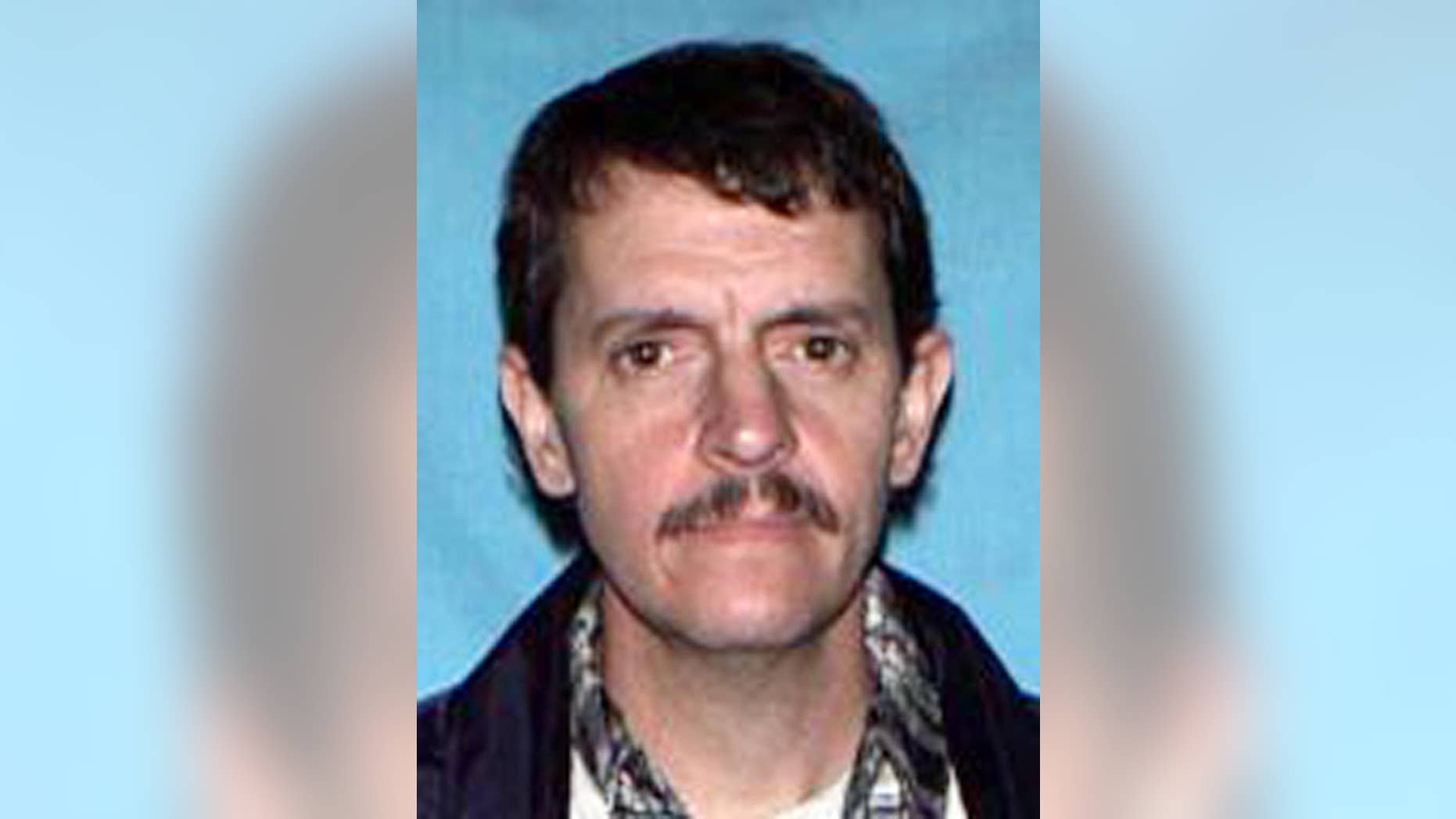 This photo provided by the Missouri State Highway Patrol shows James Barton Horn Jr., 47, of Sedalia, Mo. A Missouri woman told police she fled from a home she shared with Horn who'd been holding her captive since January, sometimes confined in a wooden box, authorities said Friday, May 1, 2015. Police and federal authorities are searching for Horn and expect he will face charges, possibly including felonious restraint, sexual assault and assault. (Missouri State Highway Patrol via AP)