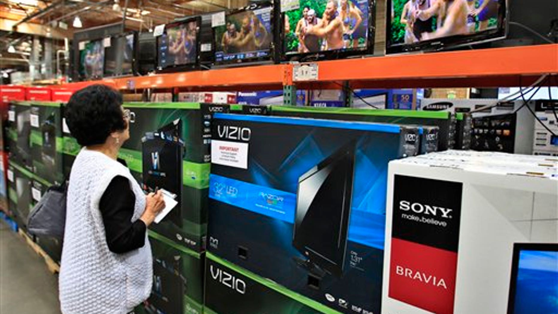April 23: A shopper looks at televisions at Costco in Mountain View, California.