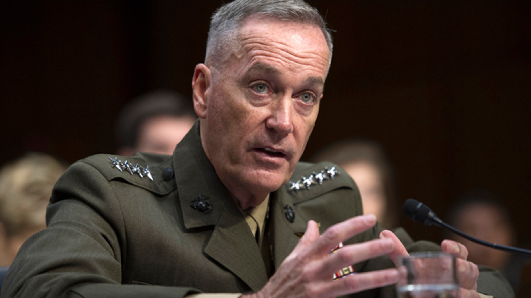 FILE - In this July 9, 2015, file photo, then-Marine Corps Commandant Gen. Joseph Dunford, Jr., testifies during his Senate Armed Services Committee confirmation hearing to become the Chairman of the Joint Chiefs of Staff, on Capitol Hill in Washington. (AP Photo/Cliff Owen, File)