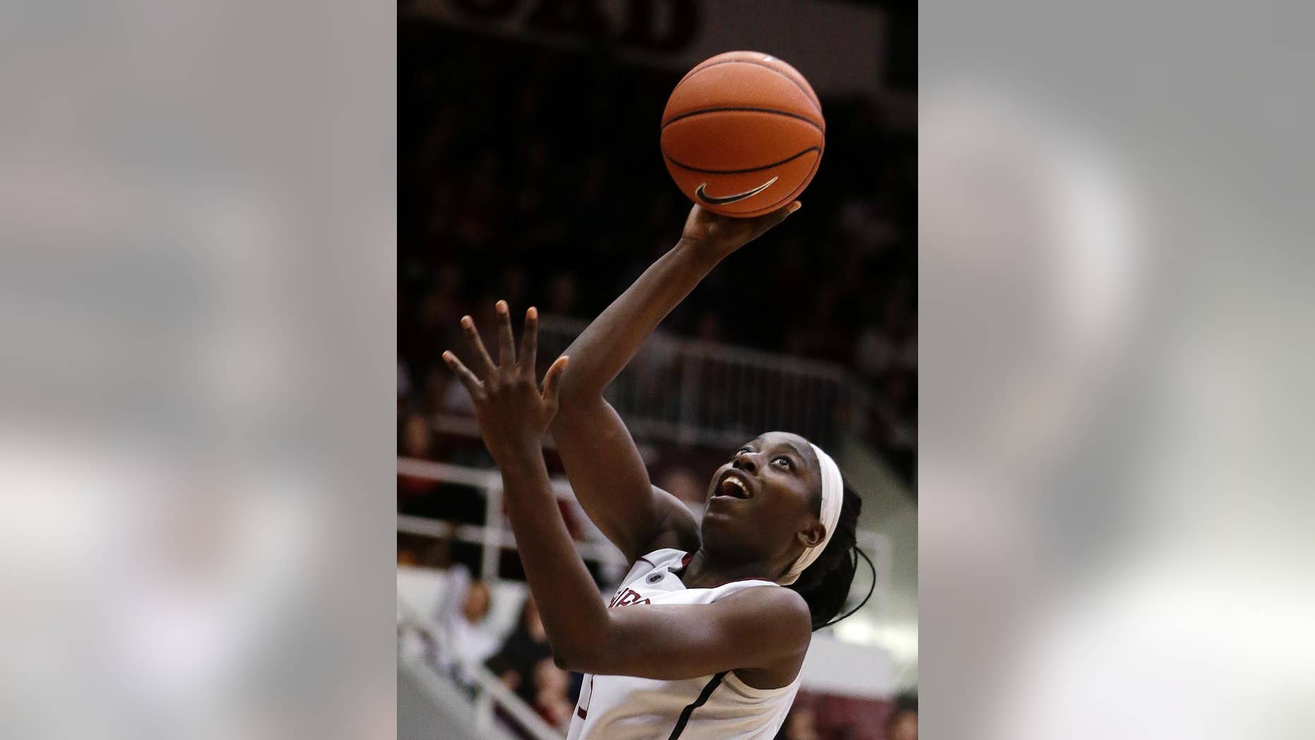 FILE - In this March 1, 2014, file photo, Stanford's Chiney Ogwumike shoots against Washington State during an NCAA college basketball game in Stanford, Calif. Ogwumike won the John R. Wooden Award on Friday night, April 11, 2014, in Los Angeles. The men's award went to Creighton's Doug McDermott. (AP Photo/Ben Margot, File)