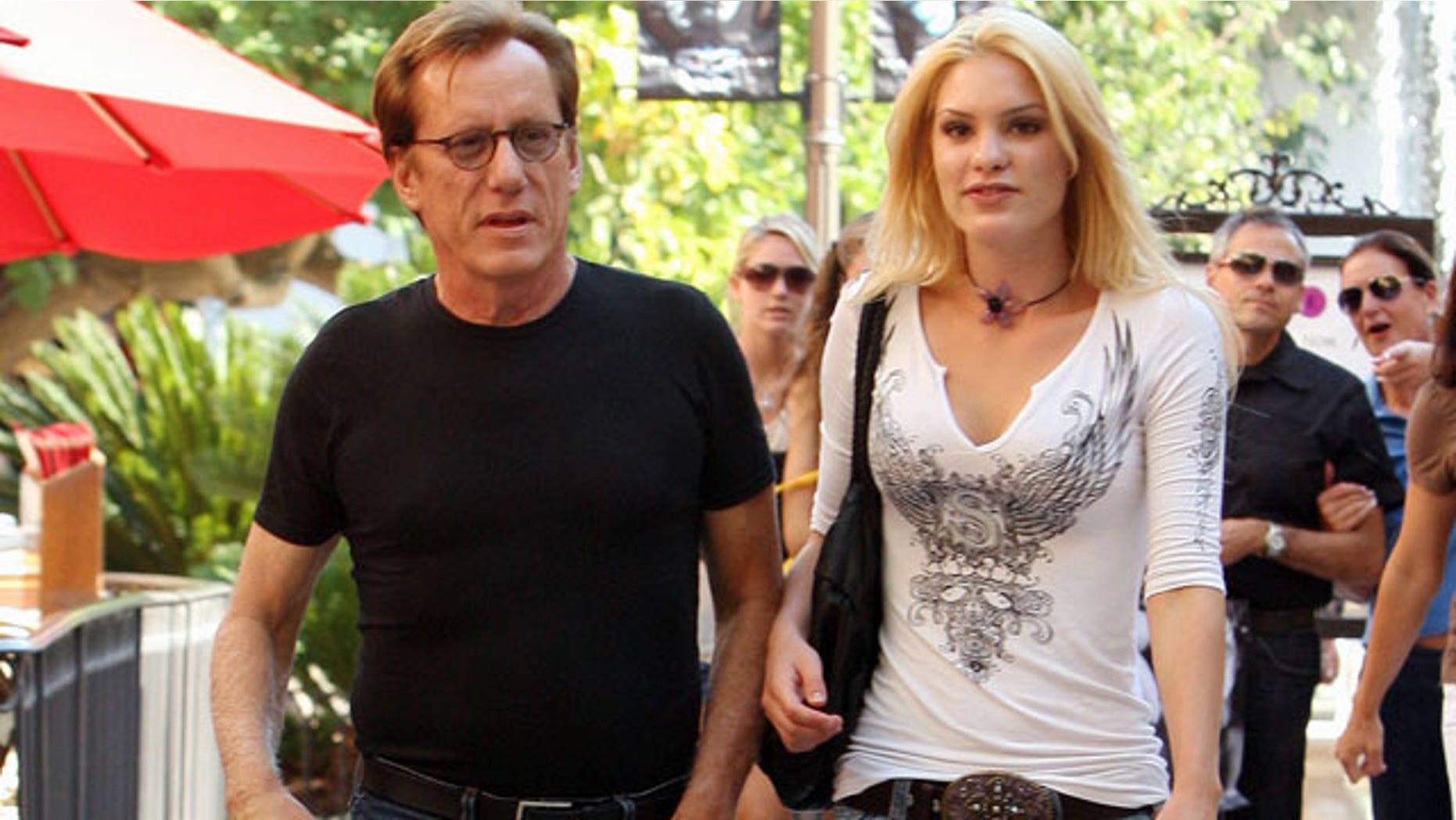 Actor James Woods, seen with Ashley Madison Myrick