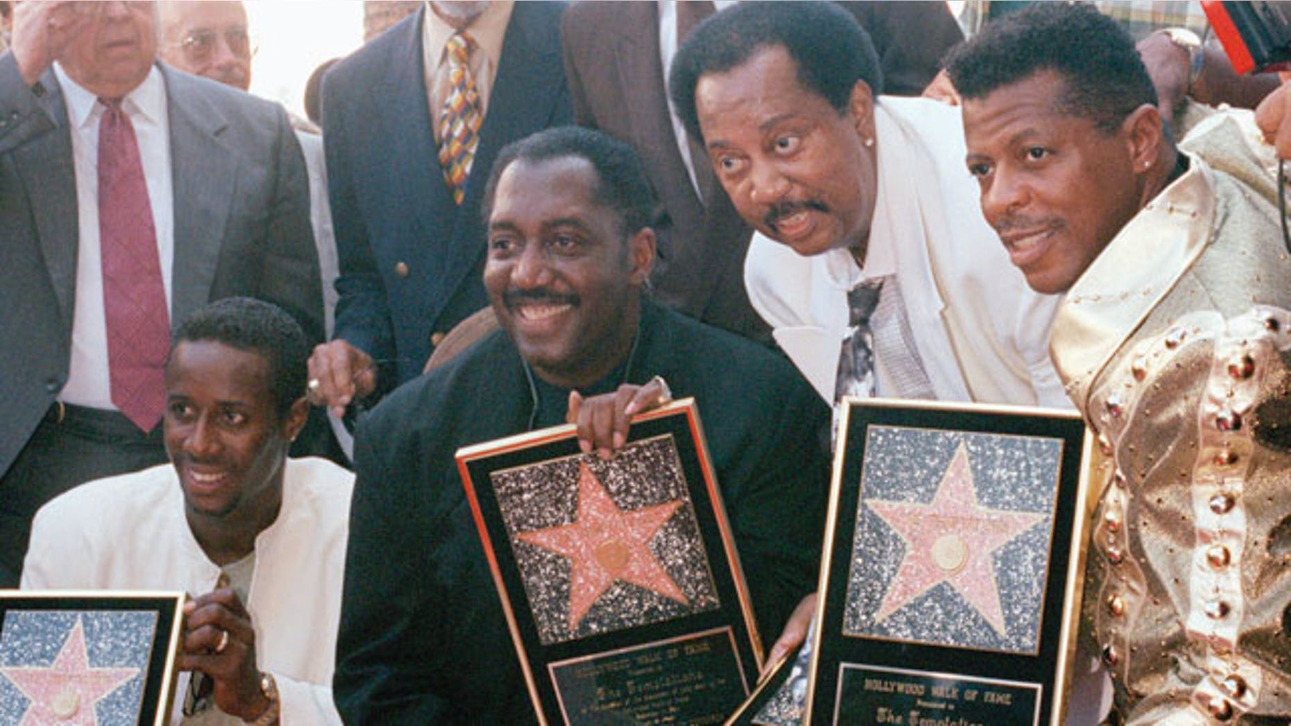 FILE - In this Sept. 14, 1994 file photo, The Temptations, from left to right, Theo Peoples, Otis Williams, Melvin Franklin, and Ali-Ollie Woodson, pose after being given a star on the Hollywood Walk of Fame in the Hollywood area of Los Angeles.