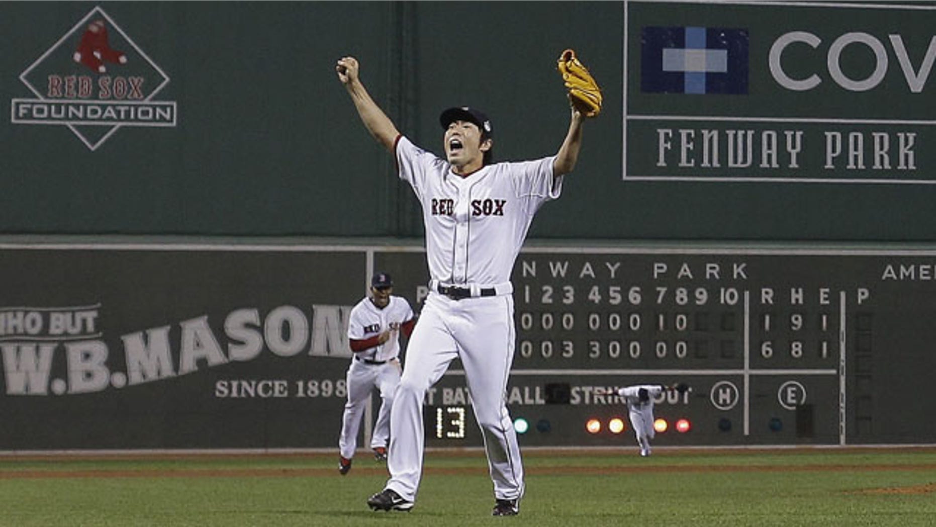 October 30, 2013: Boston Red Sox relief pitcher Koji Uehara celebrates after getting St. Louis Cardinals' Matt Carpenter to strike out and end Game 6 of baseball's World Series in Boston. The Red Sox won 6-1 to win the series. (AP Photo/David J. Phillip)