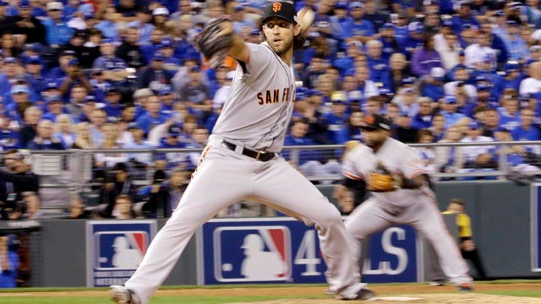 October 21, 2014: San Francisco Giants pitcher Madison Bumgarner throws during the fifth inning of Game 1 of baseball's World Series against the Kansas City Royals. (AP Photo/David J. Phillip)