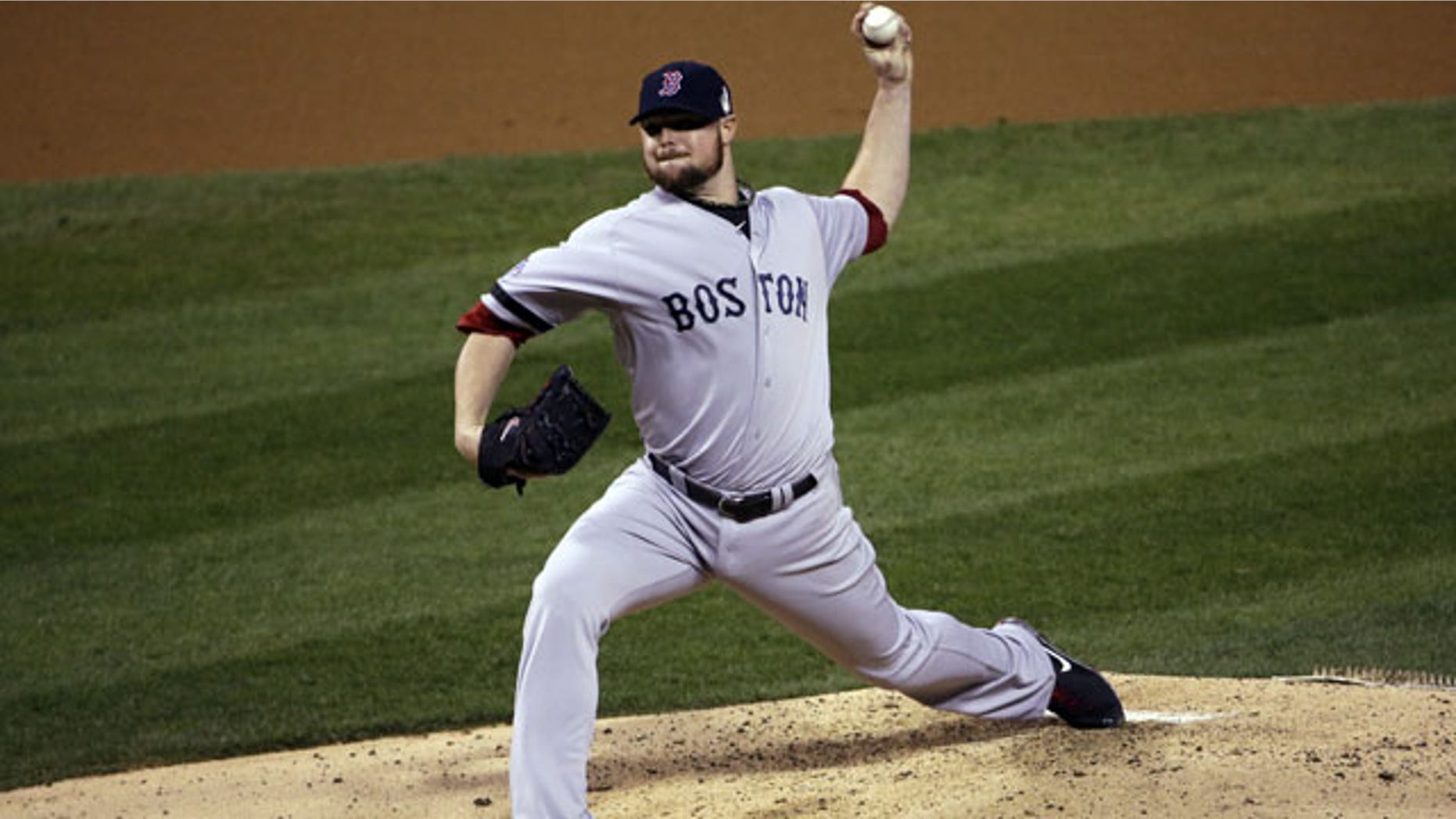 October 28, 2013: Boston Red Sox starting pitcher Jon Lester throws during the second inning of Game 5 of baseball's World Series against the St. Louis Cardinals Monday, Oct. 28, 2013, in St. Louis. (AP Photo/David J. Phillip)