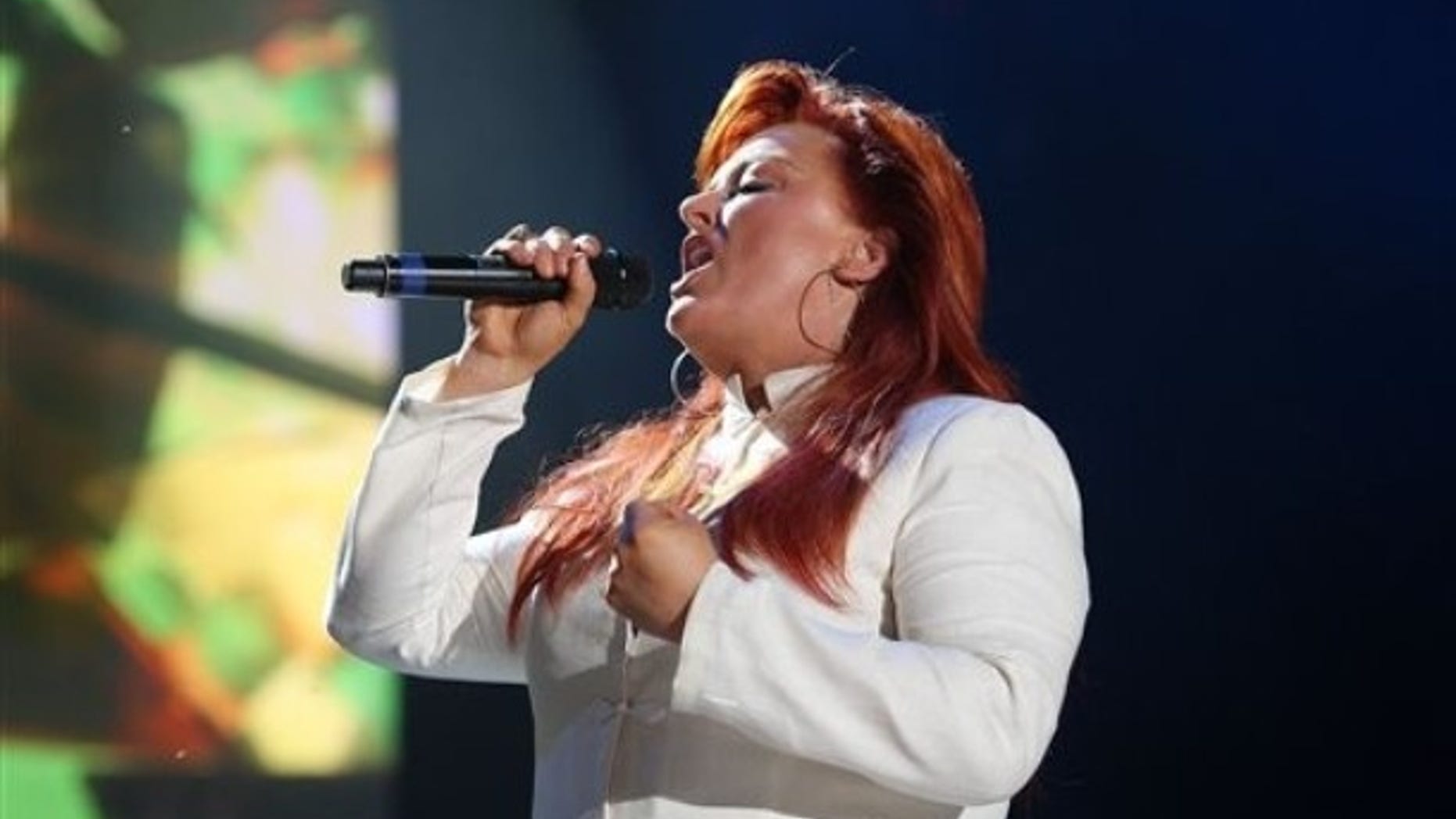 Wynonna Judd performs during the CMA Music Festival in Nashville, Tenn., Saturday, June 13, 2009. (AP Photo/Josh Anderson)