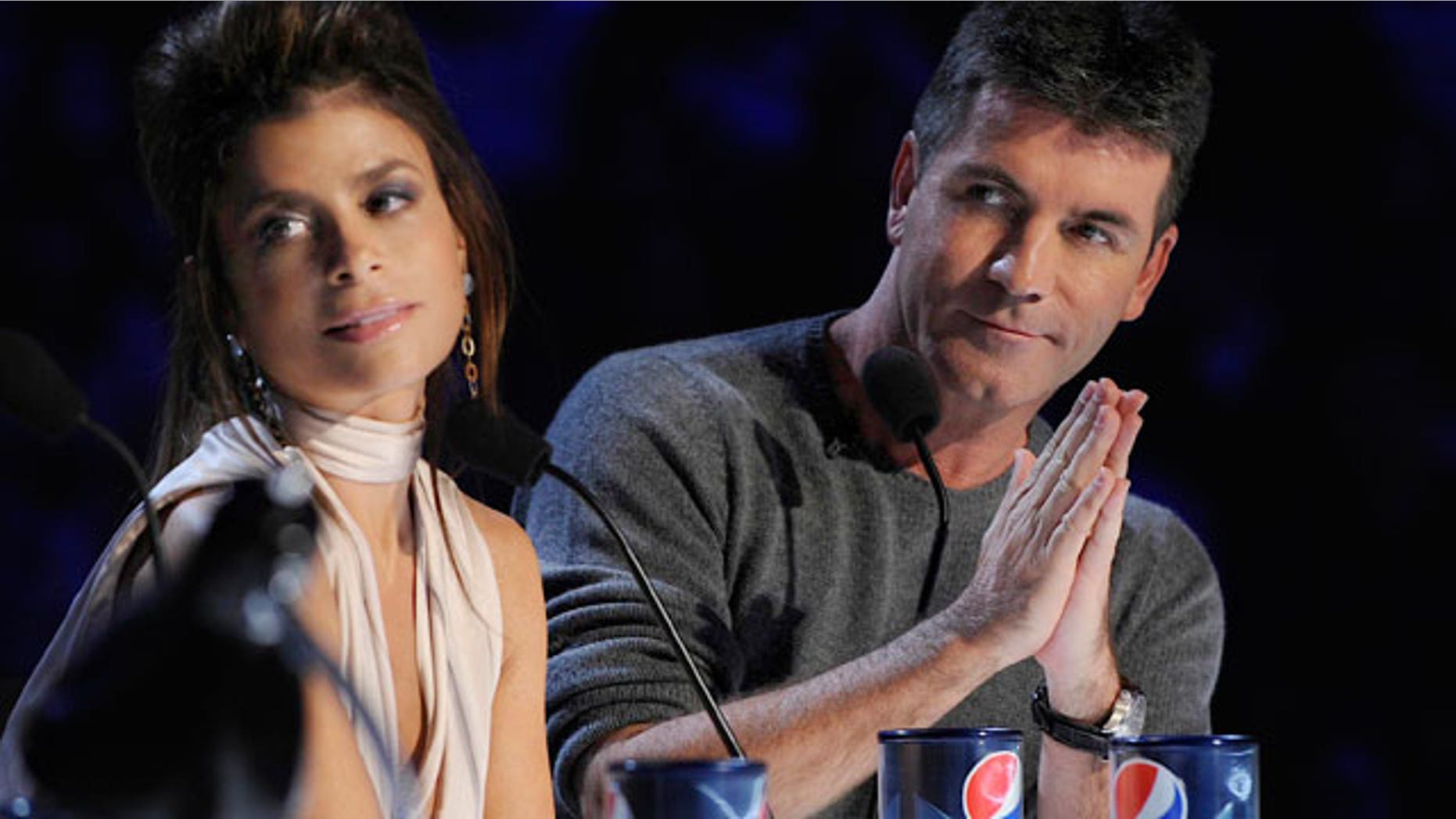 Paula Abdul and Simon Cowell (AP)