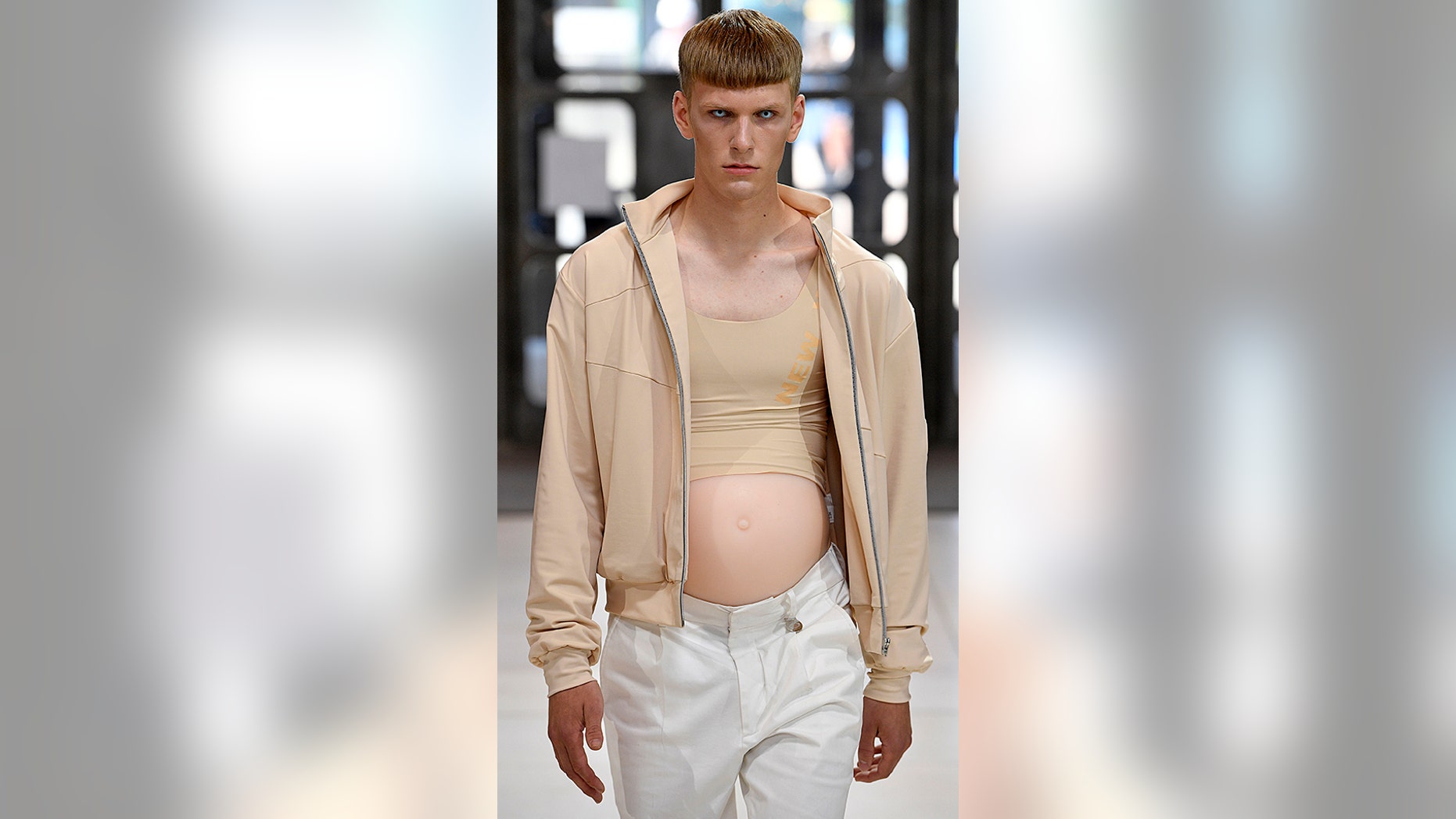 A male model showed off fashion and a belly on Monday during London Fashion Week.