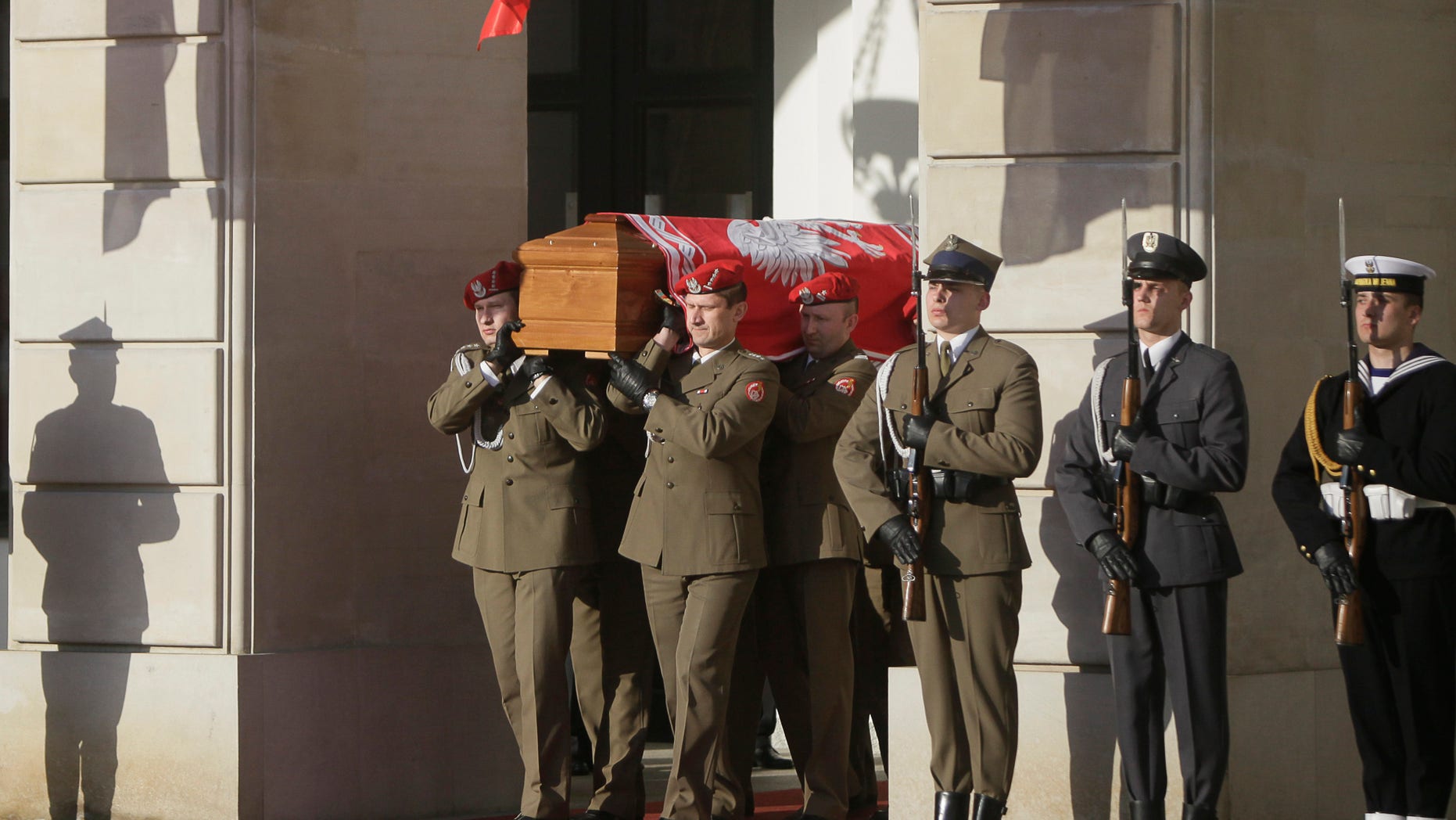 April 17: Honor guards carry the coffin of late Polish President Lech Kaczynski in front of the President's Palace in Warsaw, Poland. President Lech Kaczynski was killed in a plane crash.