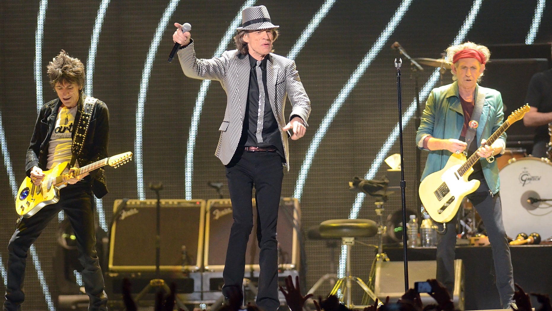 Dec. 15, 2012: In this file photo, singer Mick Jagger, center, guitarists Ronnie Wood, left, and Keith Richards, of The Rolling Stones perform live at the Prudential Center in Newark, N.J.