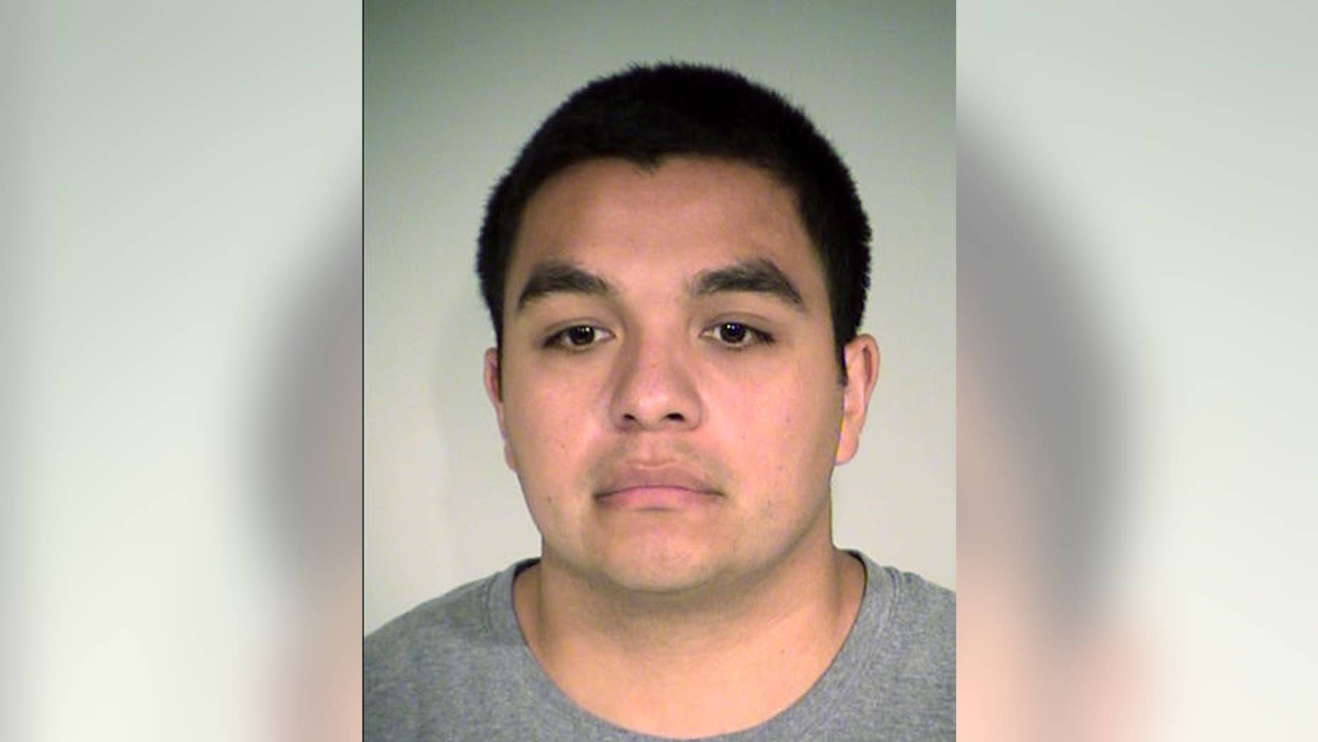 This Thursday, Nov. 17, 2016 photo provided by the Ramsey County Sheriff's Office shows Jeronimo Yanez. Yanez, a St. Anthony police officer, who is charged with second-degree manslaughter in the shooting death of Philando Castile, turned himself in Thursday, and was processed and released. He is expected to make his first court appearance Friday Nov. 18. (Ramsey County Sheriff's Office via AP)