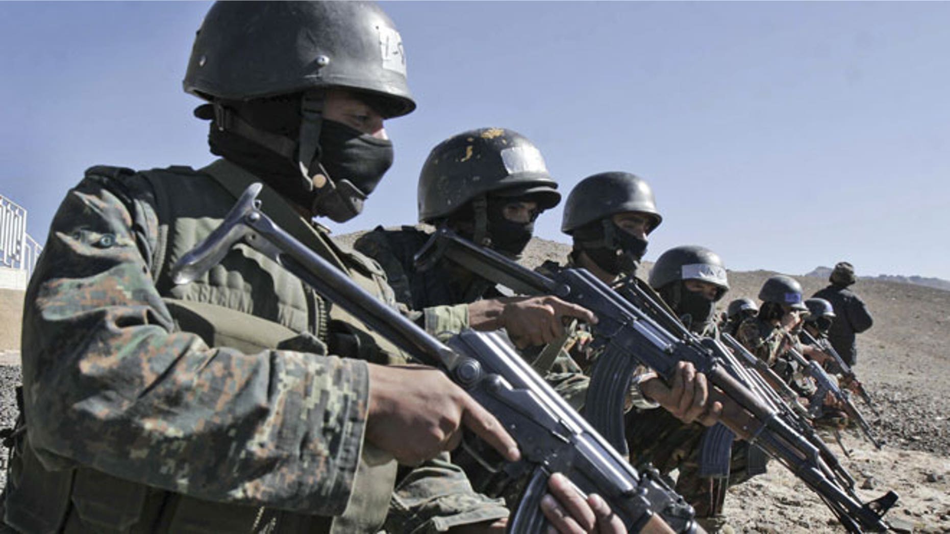 In this Wednesday, Jan. 6, 2010 file photo, an anti-terrorist unit from the Central Security Forces of the Ministry of Interior trains in the Sarif area on the eastern outskirts of the capital Sana, in Yemen.