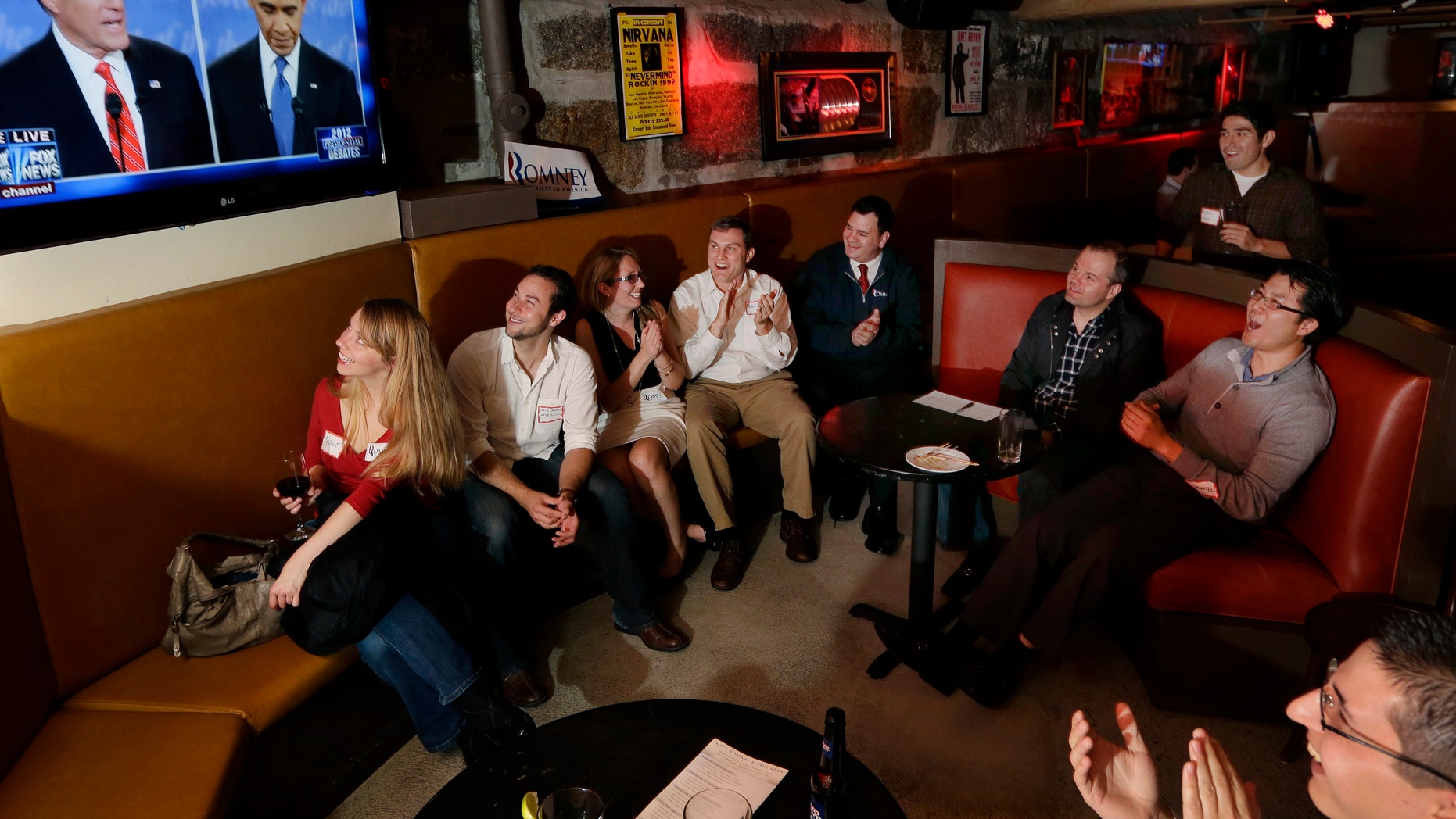 FILE - In this Oct. 3, 2012 file photo members of the Massachusetts GOP Young Republicans react as they watch the first presidential debate between President Barack Obama and Republican Mitt Romney in Boston. Republicans lost the popular vote for the fifth time in the last six presidential elections with the latest loss due in large measure to Obamaâs advantage over Romney among younger and non-white voters. Young party leaders say Republicans aiming to reach beyond the partyâs white, aging core need to do more than just retool campaign strategy and tactics. They also need GOP elected officials to offer concrete policies to counter Democratic initiatives. (AP Photo/Elise Amendola, File)