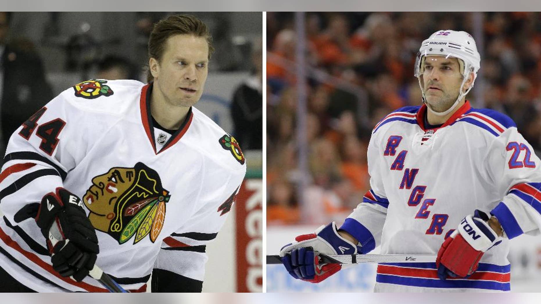 ADVANCE FOR WEEKEND EDITIONS, MAY 15-17 - FILE - At left, in a March 21, 2015, file photo, Chicago Blackhawks defenseman Kimmo Timonen (44) skates during warms ups before an NHL hockey game in Dallas. At right, in a Feb. 28, 2015, file photo, New York Rangers' Dan Boyle skates during an NHL hockey game against the Philadelphia Flyers in Philadelphia. Eight of Anaheim's best players are 24 or younger, and Tampa Bay has the youngest remaining player in the NHL playoffs in 20-year-old winger Jonathan Drouin. The Blackhawks counter with 20-year-old forward Teuvo Teravainen, and the oldest remaining player in 40-year-old defenseman Kimmo Timonen. The Rangers have seasoned veterans Martin St. Louis and Dan Boyle. (AP Photo/File)