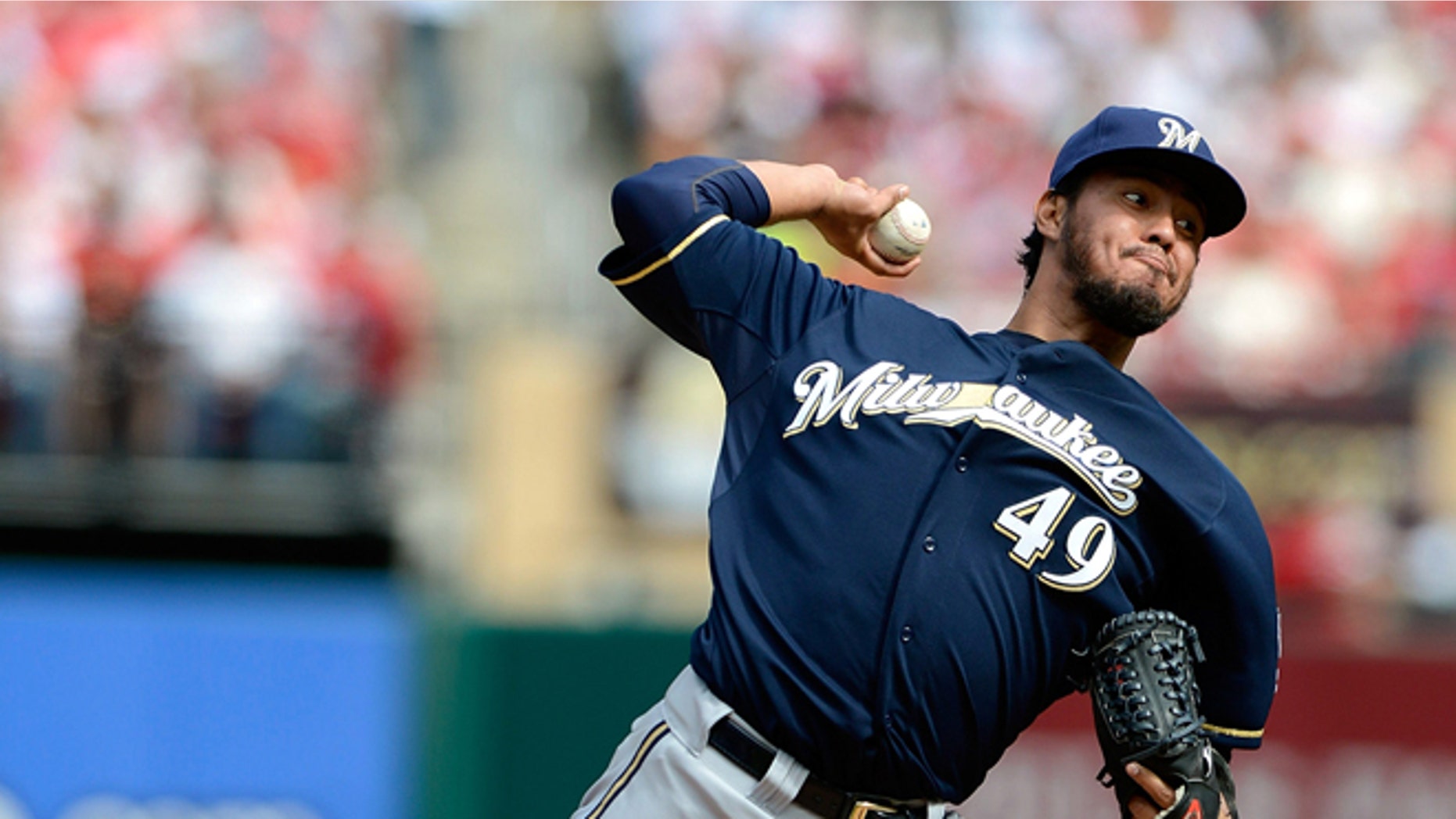 ST. LOUIS, MO - APRIL 13: Yovani Gallardo #49 of the Milwaukee Brewers throws to a St. Louis Cardinals batter during the first inning at Busch Stadium on April 13, 2013 in St. Louis, Missouri. (Photo by Jeff Curry/Getty Images)