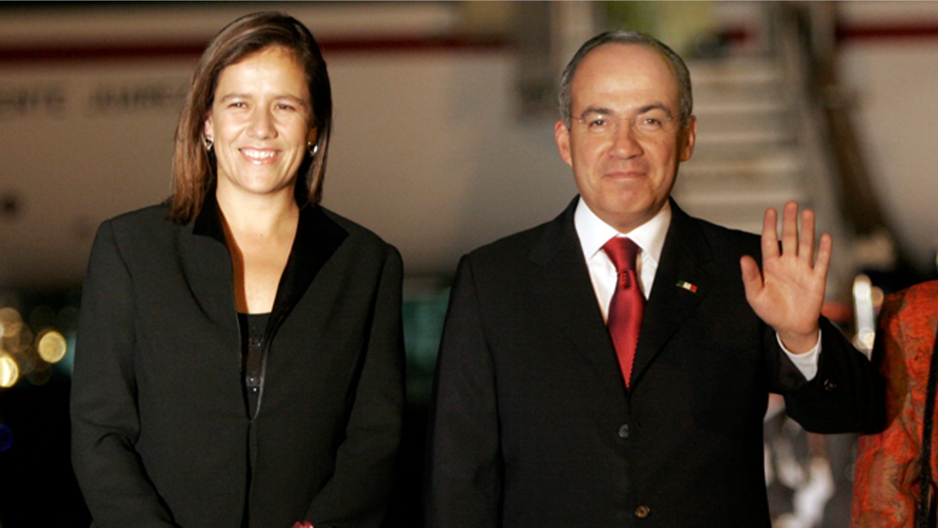 FILE - In this Jan. 13, 2008, file photo, Mexico's former president Felipe Calderon, right, accompanied by his wife Margarita Zavala, waves upon their arrival to a military airport in Guatemala City. Zavala announced on Sunday, June 14, 2015, her intention to run for president of Mexico in the 2018 elections. (AP Photo/Moises Castillo, File)