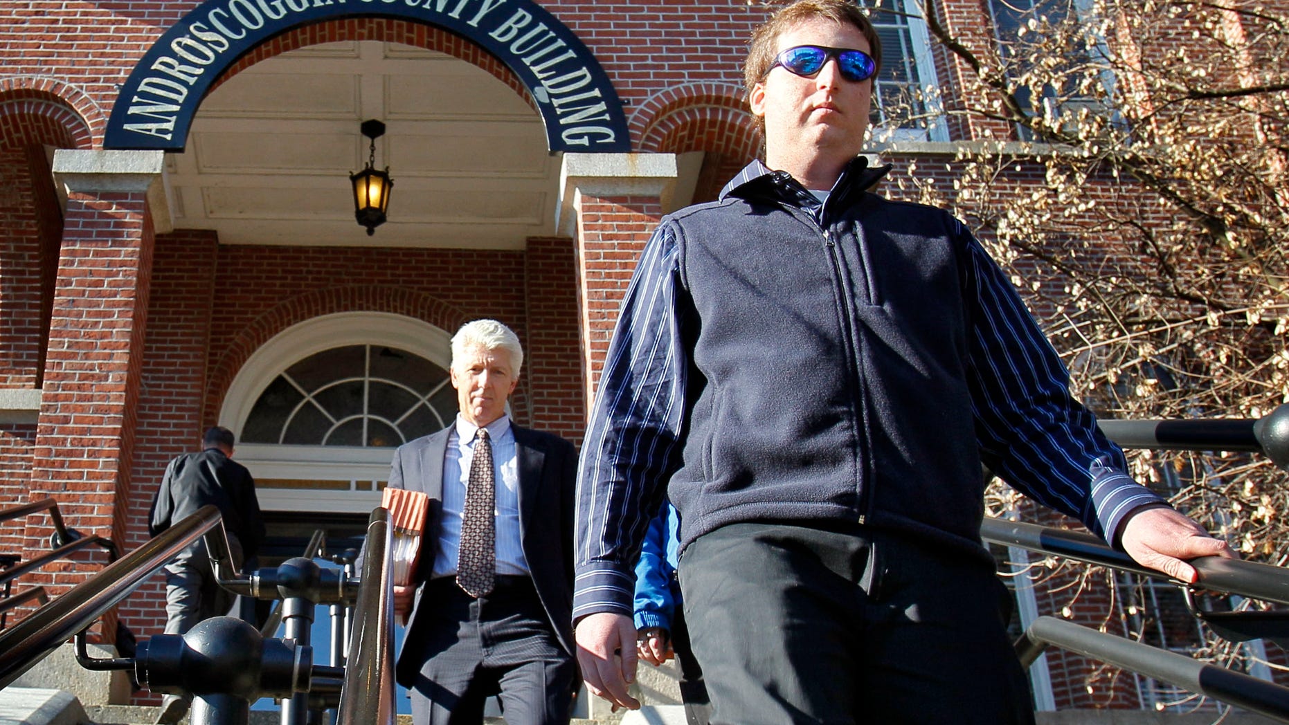Dec. 1, 2011: Zach Tomaselli, 23, of Lewiston, Maine, right, and his lawyer, Justin Leary, leave Androscoggin Superior Court in Auburn, Maine. Tomaselli, who accused former Syracuse assistant basketball coach Bernie Fine of molesting him is seeking to suppress evidence in his own molestation case in Maine.