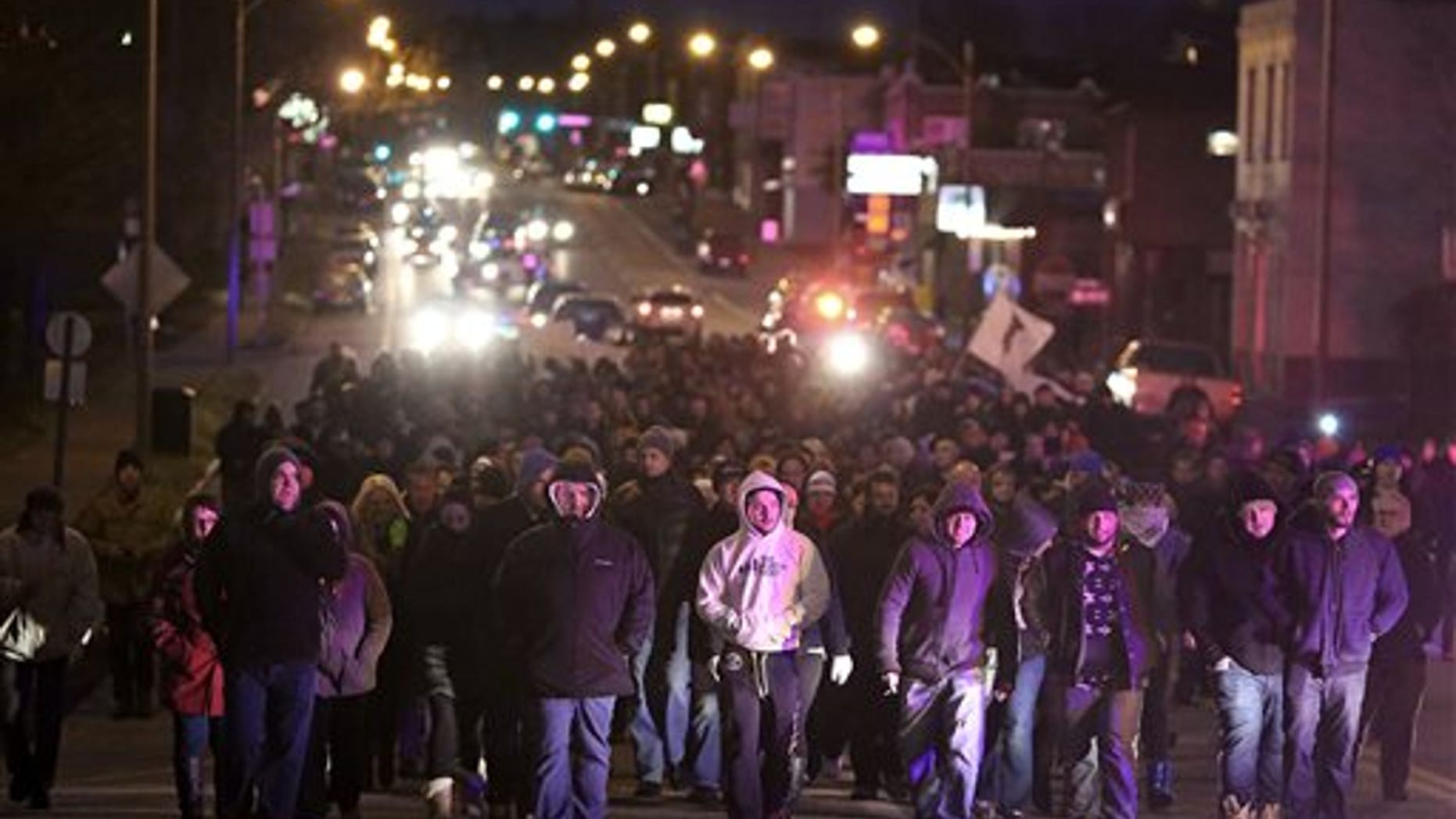 Dec. 1: Bosnians march along Gravois Road to protest the murder of Zemir Begic, a Bosnian man, in St. Louis.