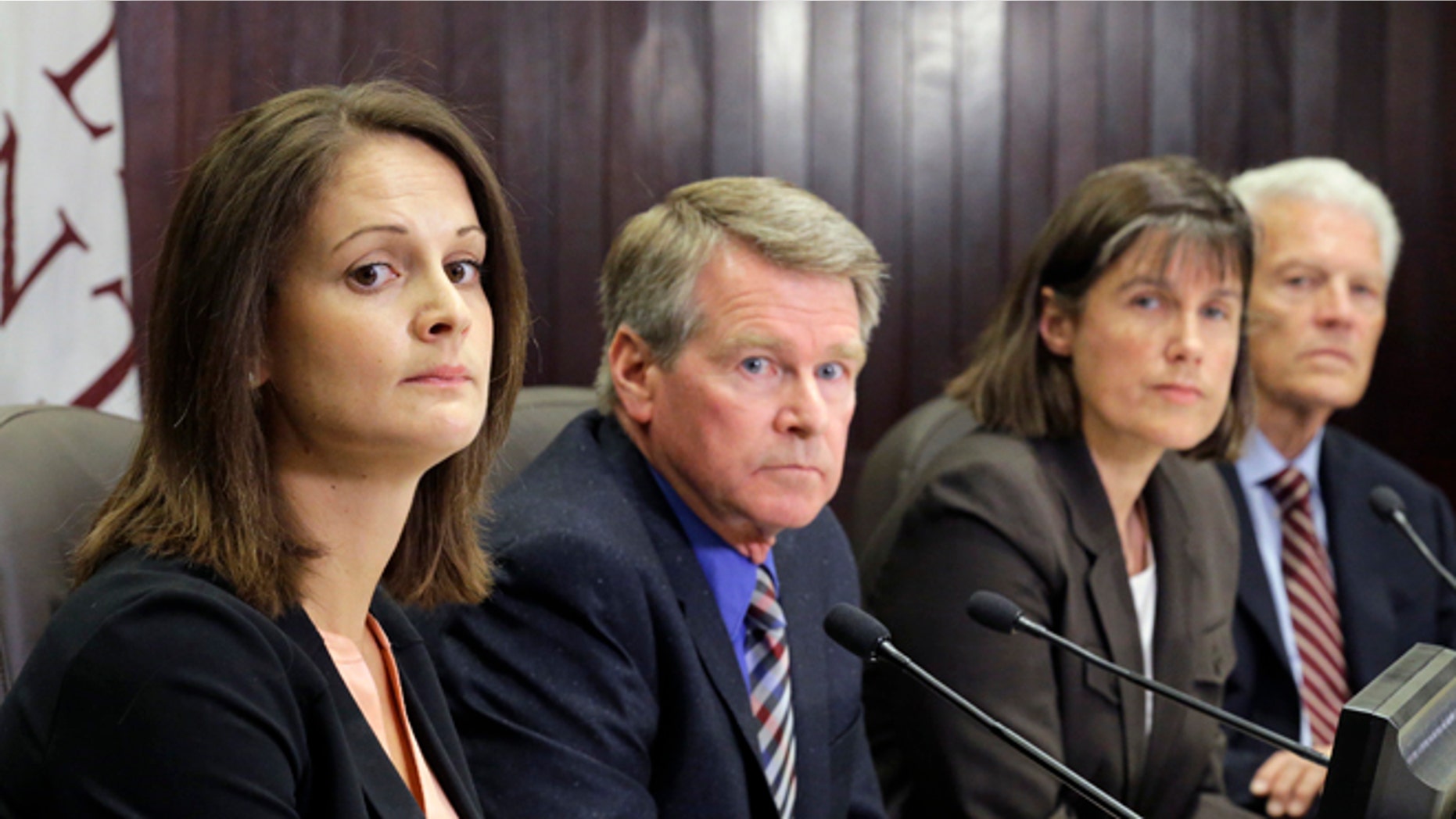 Left to right, Dr. Angela Dunn, deputy state epidemiologist at the Utah Department of Health; Gary Edwards, executive director, Salt Lake County Health Department; Dr. J. Erin Staples, Medical Epidemiologist, Centers for Disease Control and Prevention,and Dr. Edward Clark Associate Vice President Clinical Affairs University of Utah speak during a news conference Monday, July 18, 2016, in Salt Lake City. A person who cared for a Zika-infected relative in Utah also got the virus, but exactly how it was transmitted is a medical mystery, health officials announced Monday. (AP Photo/Rick Bowmer)